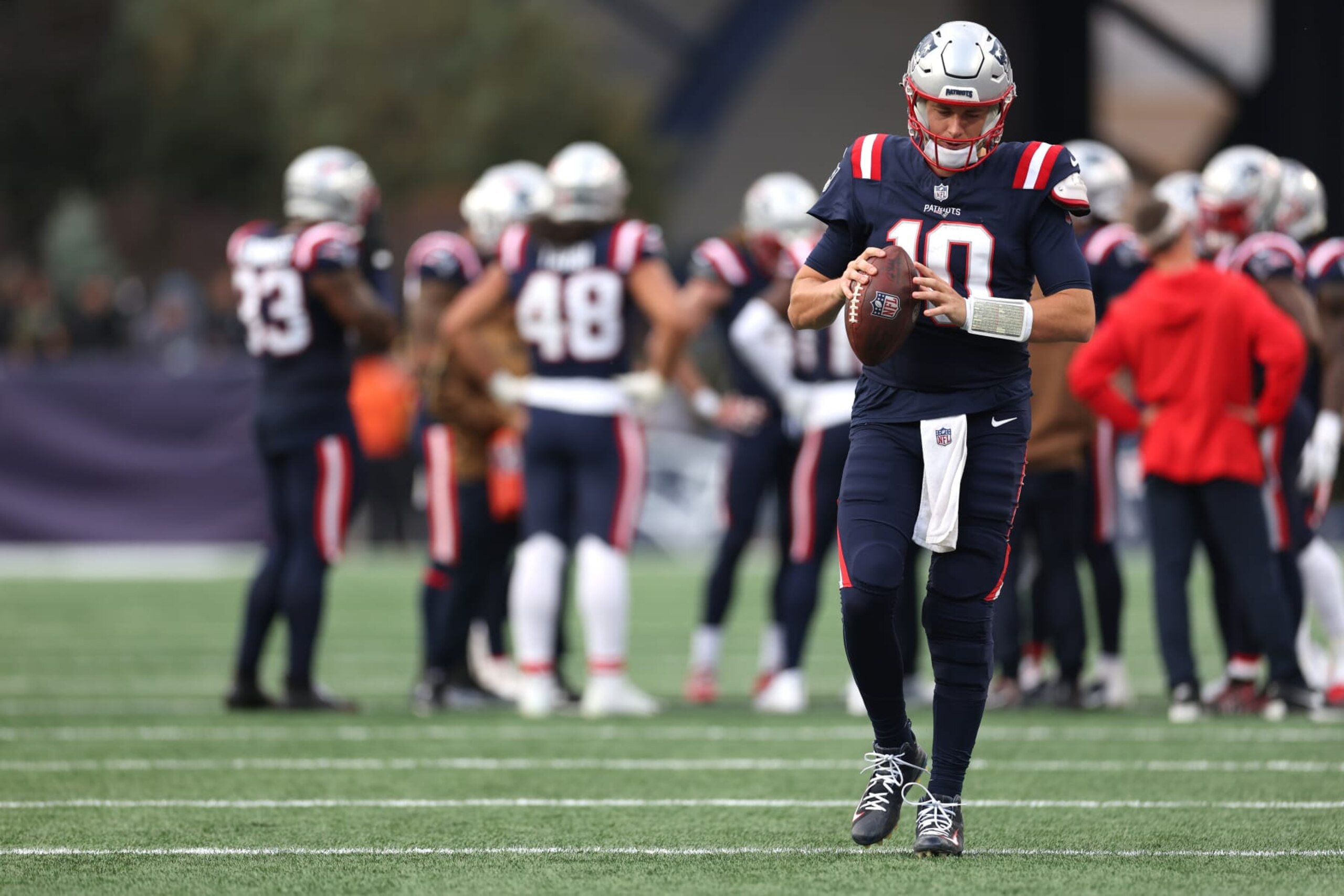 FOXBOROUGH, MASSACHUSETTS - NOVEMBER 05: Mac Jones #10 of the New England Patriots looks on in the game against the Washington Commanders during the second half at Gillette Stadium on November 05, 2023 in Foxborough, Massachusetts. (Photo by Maddie Meyer/Getty Images) FOXBOROUGH, MASSACHUSETTS - NOVEMBER 05: Mac Jones #10 of the New England Patriots looks on in the game against the Washington Commanders during the second half at Gillette Stadium on November 05, 2023 in Foxborough, Massachusetts. (Photo by Maddie Meyer/Getty Images)