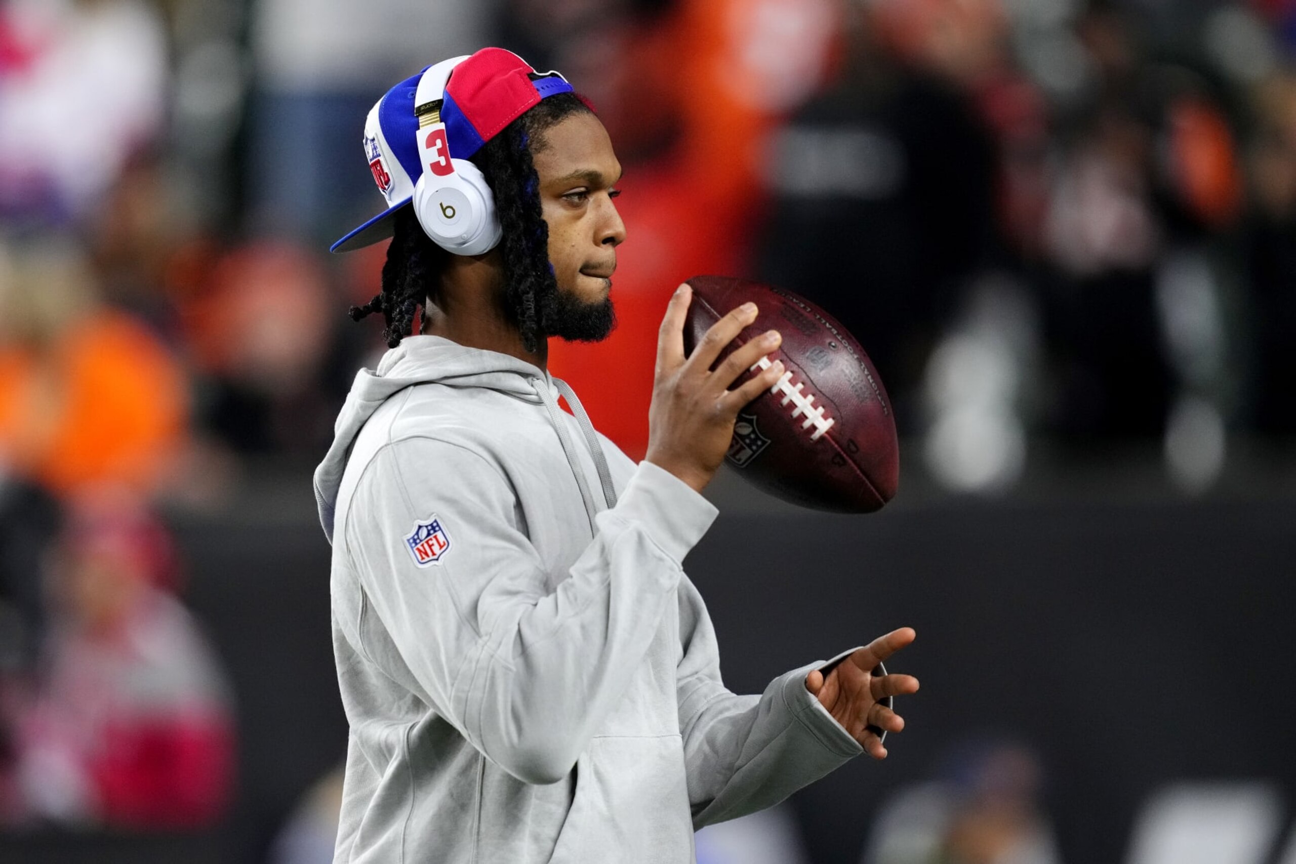 CINCINNATI, OHIO - NOVEMBER 05:  Damar Hamlin #3 of the Buffalo Bills holds a football during warmups prior to the game against the Cincinnati Bengals at Paycor Stadium on November 05, 2023 in Cincinnati, Ohio. (Photo by Dylan Buell/Getty Images)