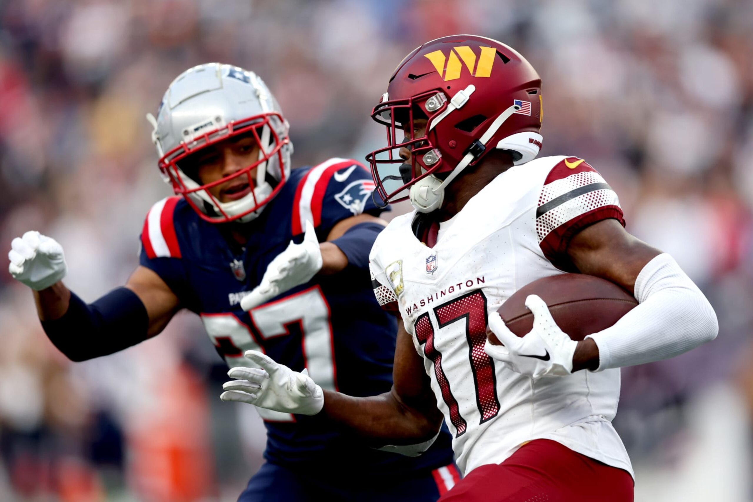 FOXBOROUGH, MASSACHUSETTS - NOVEMBER 05: Terry McLaurin #17 of the Washington Commanders runs the ball in the game against the New England Patriots at Gillette Stadium on November 05, 2023 in Foxborough, Massachusetts. (Photo by Adam Glanzman/Getty Images) FOXBOROUGH, MASSACHUSETTS - NOVEMBER 05: Terry McLaurin #17 of the Washington Commanders runs the ball in the game against the New England Patriots at Gillette Stadium on November 05, 2023 in Foxborough, Massachusetts. (Photo by Adam Glanzman/Getty Images)
