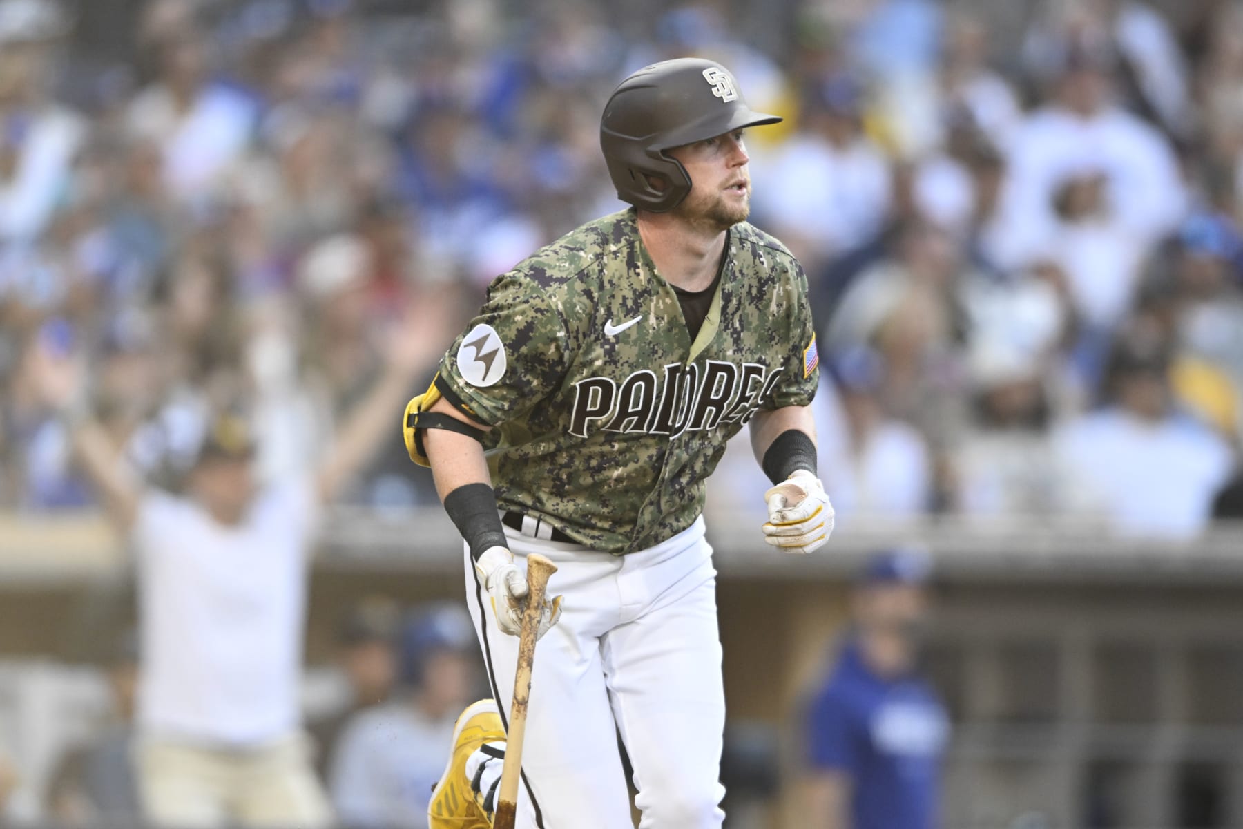 SAN DIEGO, CA - AUGUST 6: Jake Cronenworth #9 of the San Diego Padres plays during a baseball game against the against the Los Angeles Dodgers on August 6, 2023 at Petco Park in San Diego, California. (Photo by Denis Poroy/Getty Images)
