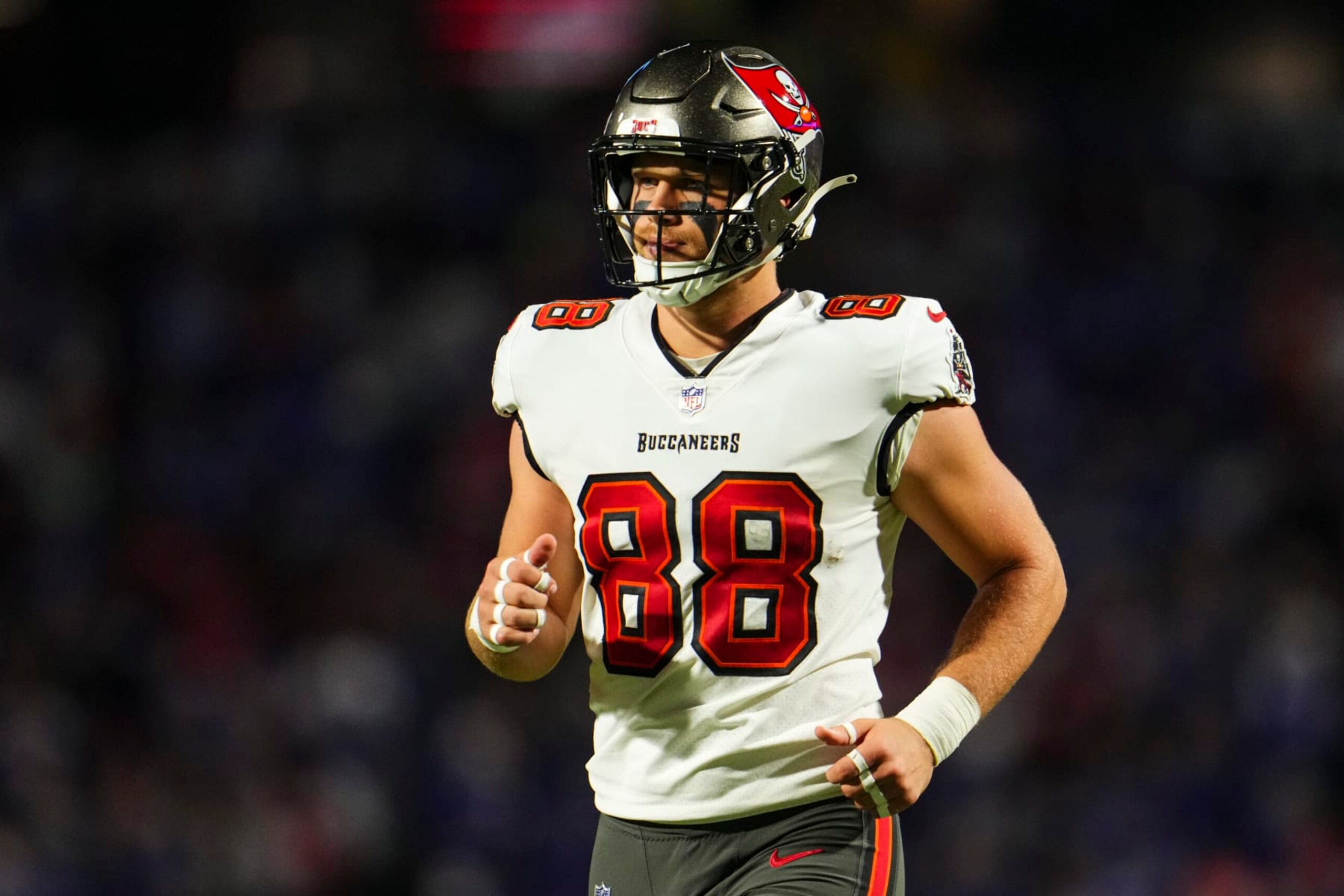 ORCHARD PARK, NY - OCTOBER 26: Cade Otton #88 of the Tampa Bay Buccaneers runs across the field during an NFL football game against the Buffalo Bills at Highmark Stadium on October 26, 2023 in Orchard Park, New York. (Photo by Cooper Neill/Getty Images)