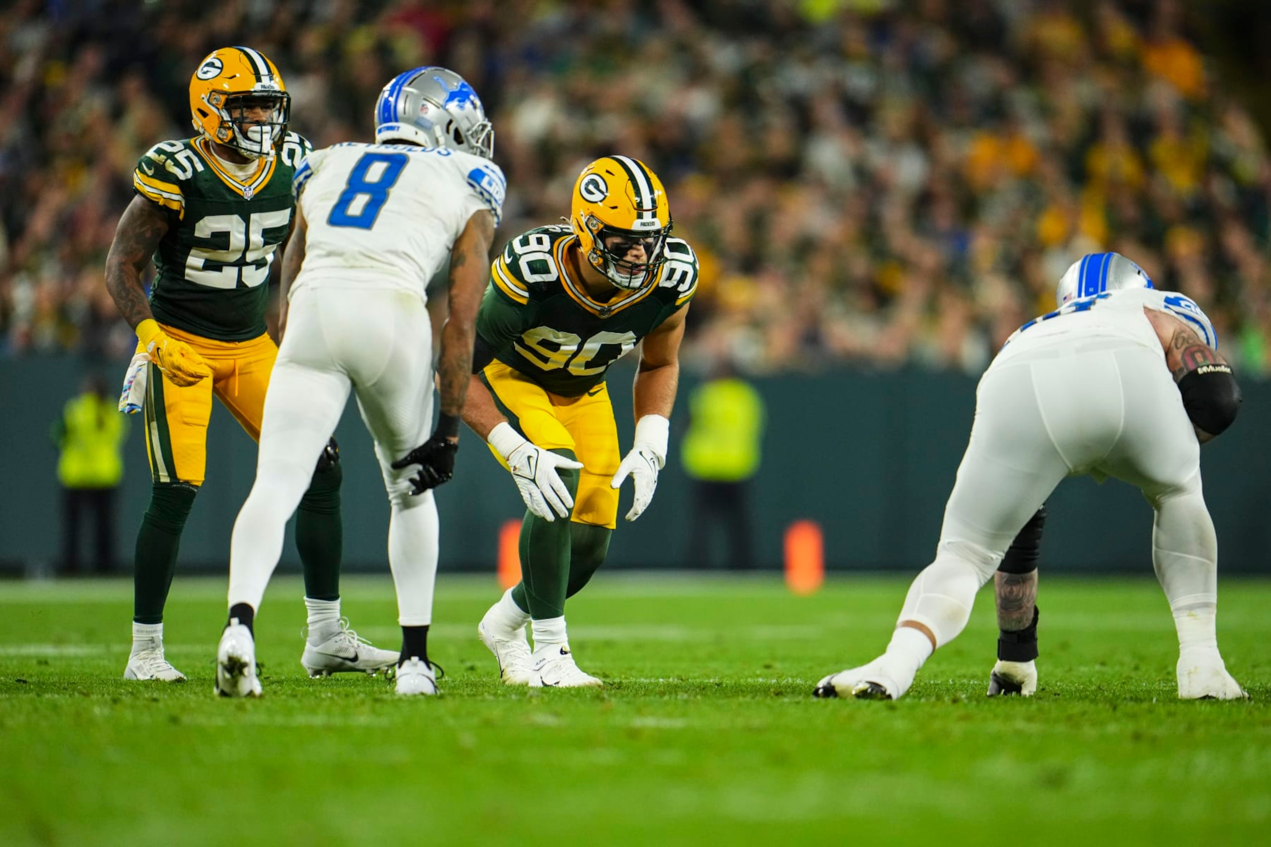 GREEN BAY, WI - SEPTEMBER 28: Lukas Van Ness #90 of the Green Bay Packers lines up before the play during at Lambeau Field on September 28, 2023 in Green Bay, Wisconsin. (Photo by Cooper Neill/Getty Images)