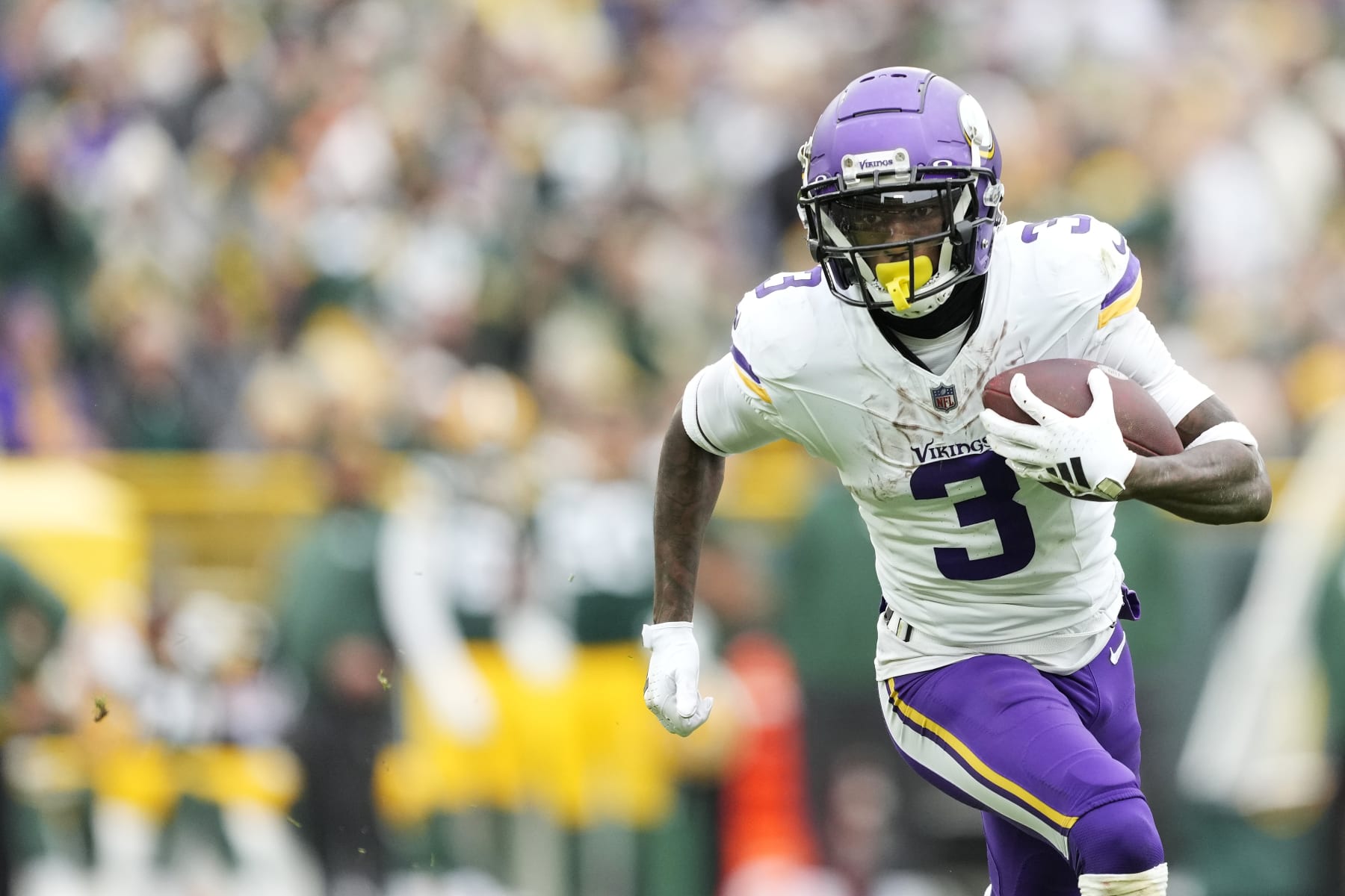 GREEN BAY, WISCONSIN - OCTOBER 29: Jordan Addison #3 of the Minnesota Vikings runs with the ball against the Green Bay Packers in the first half at Lambeau Field on October 29, 2023 in Green Bay, Wisconsin. (Photo by Patrick McDermott/Getty Images)