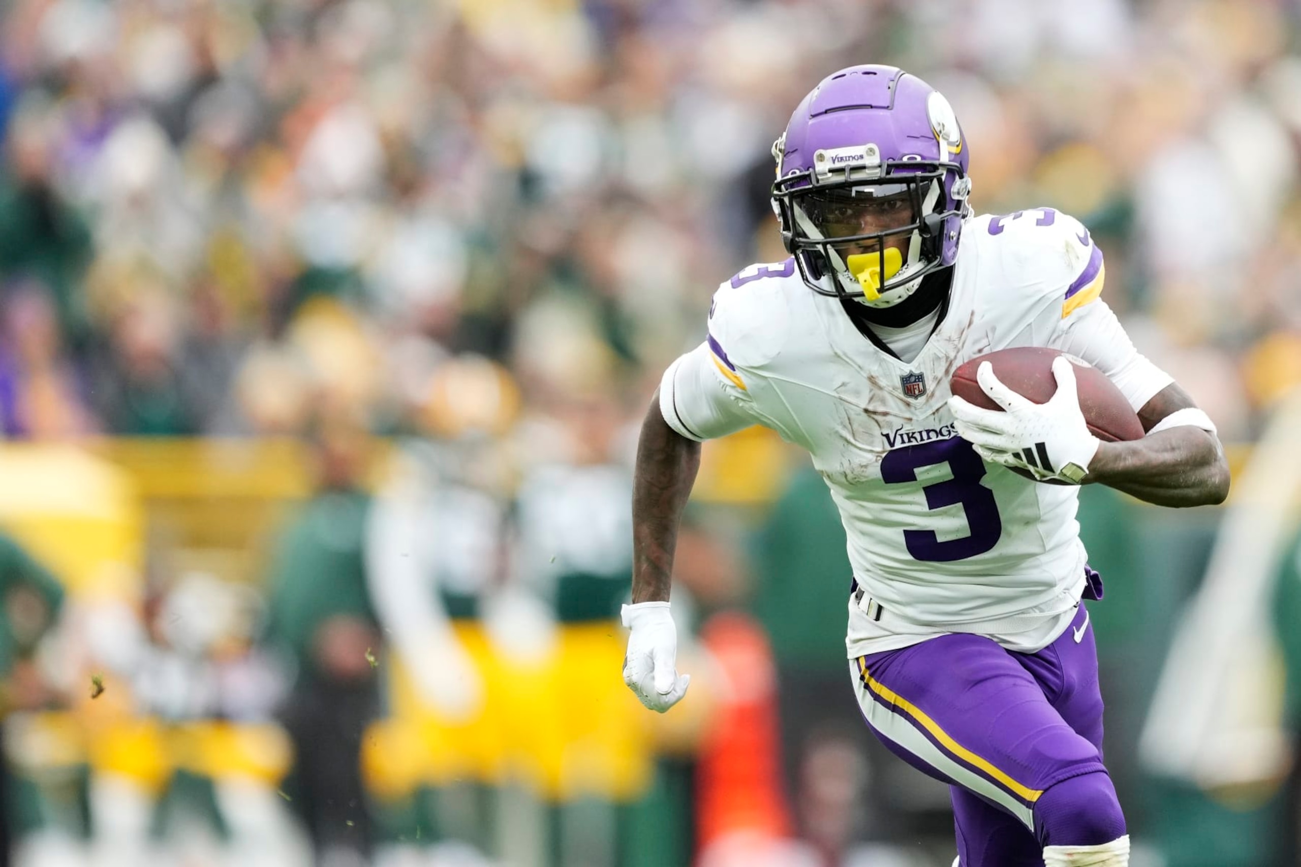 GREEN BAY, WISCONSIN - OCTOBER 29: Jordan Addison #3 of the Minnesota Vikings runs with the ball against the Green Bay Packers in the first half at Lambeau Field on October 29, 2023 in Green Bay, Wisconsin. (Photo by Patrick McDermott/Getty Images)