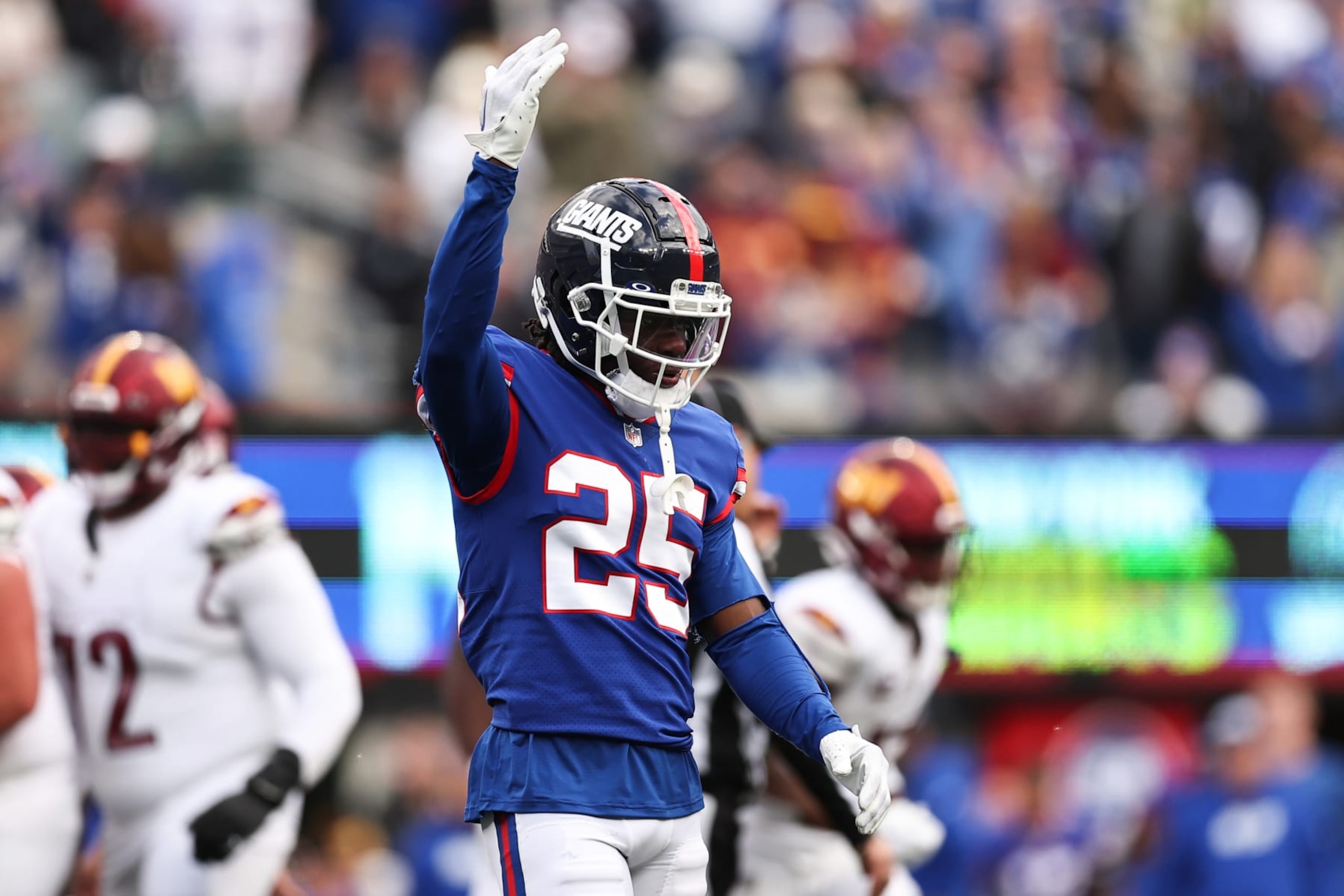 EAST RUTHERFORD, NEW JERSEY - OCTOBER 22: Deonte Banks #25 of the New York Giants reacts during the second half of the game against the Washington Commanders at MetLife Stadium on October 22, 2023 in East Rutherford, New Jersey. (Photo by Dustin Satloff/Getty Images)