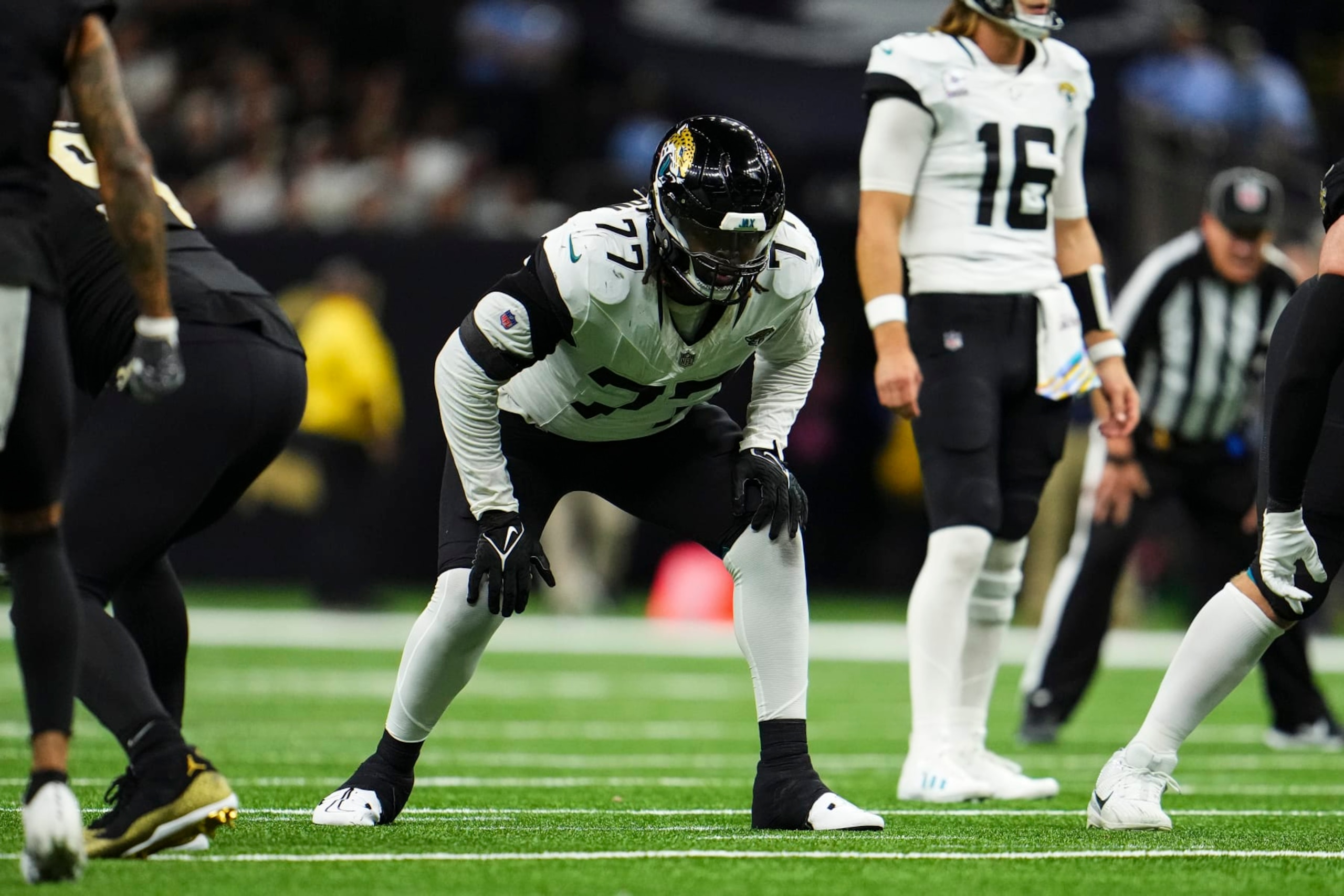 NEW ORLEANS, LA - OCTOBER 19: Anton Harrison #77 of the Jacksonville Jaguars lines up to block during an NFL football game against the New Orleans Saints at Caesars Superdome on October 19, 2023 in New Orleans, Louisiana. (Photo by Cooper Neill/Getty Images)