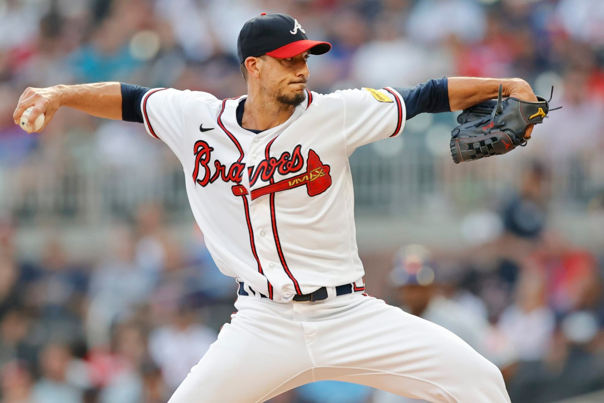 ATLANTA, GEORGIA - AUGUST 23: Charlie Morton #50 of the Atlanta Braves pitches during the first inning against the New York Mets at Truist Park on August 23, 2023 in Atlanta, Georgia. (Photo by Alex Slitz/Getty Images)