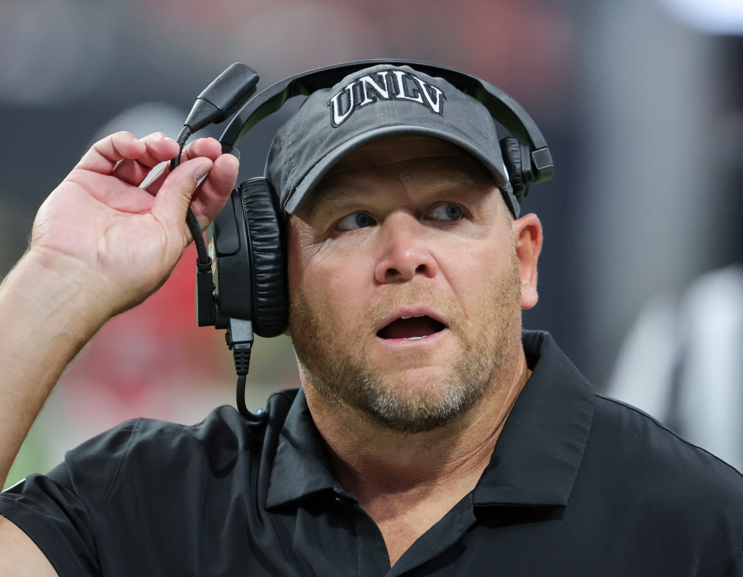 LAS VEGAS, NEVADA - SEPTEMBER 16: Head coach Barry Odom of the UNLV Rebels looks on in the second quarter of a game against the Vanderbilt Commodores at Allegiant Stadium on September 16, 2023 in Las Vegas, Nevada. The Rebels defeated the Commodores 40-37. (Photo by Ethan Miller/Getty Images)