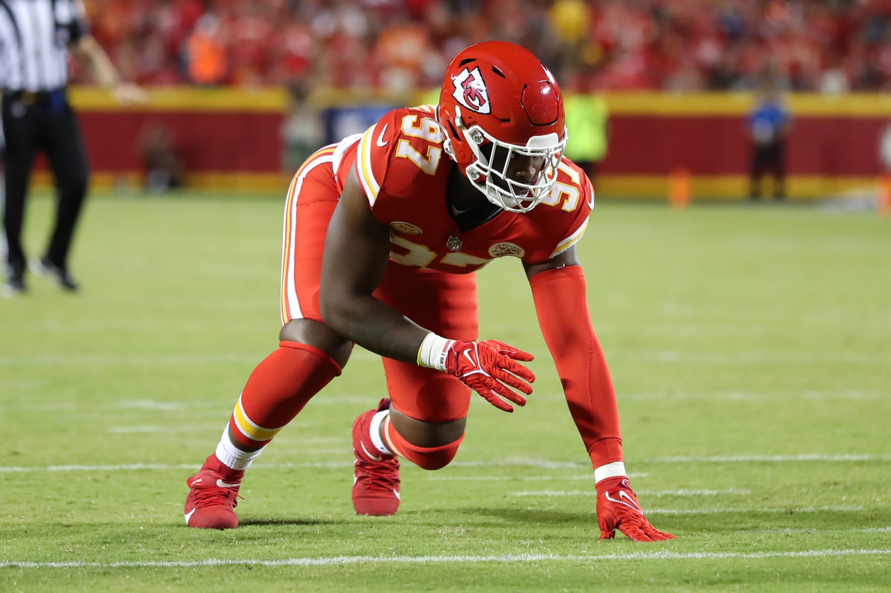 KANSAS CITY, MO - OCTOBER 12: Kansas City Chiefs defensive end Felix Anudike-Uzomah (97) in a three-point stance in the second quarter of an AFC West matchup between the Denver Broncos and Kansas City Chiefs on Oct 12, 2023 at GEHA Field at Arrowhead Stadium in Kansas City, MO.  (Photo by Scott Winters/Icon Sportswire via Getty Images)