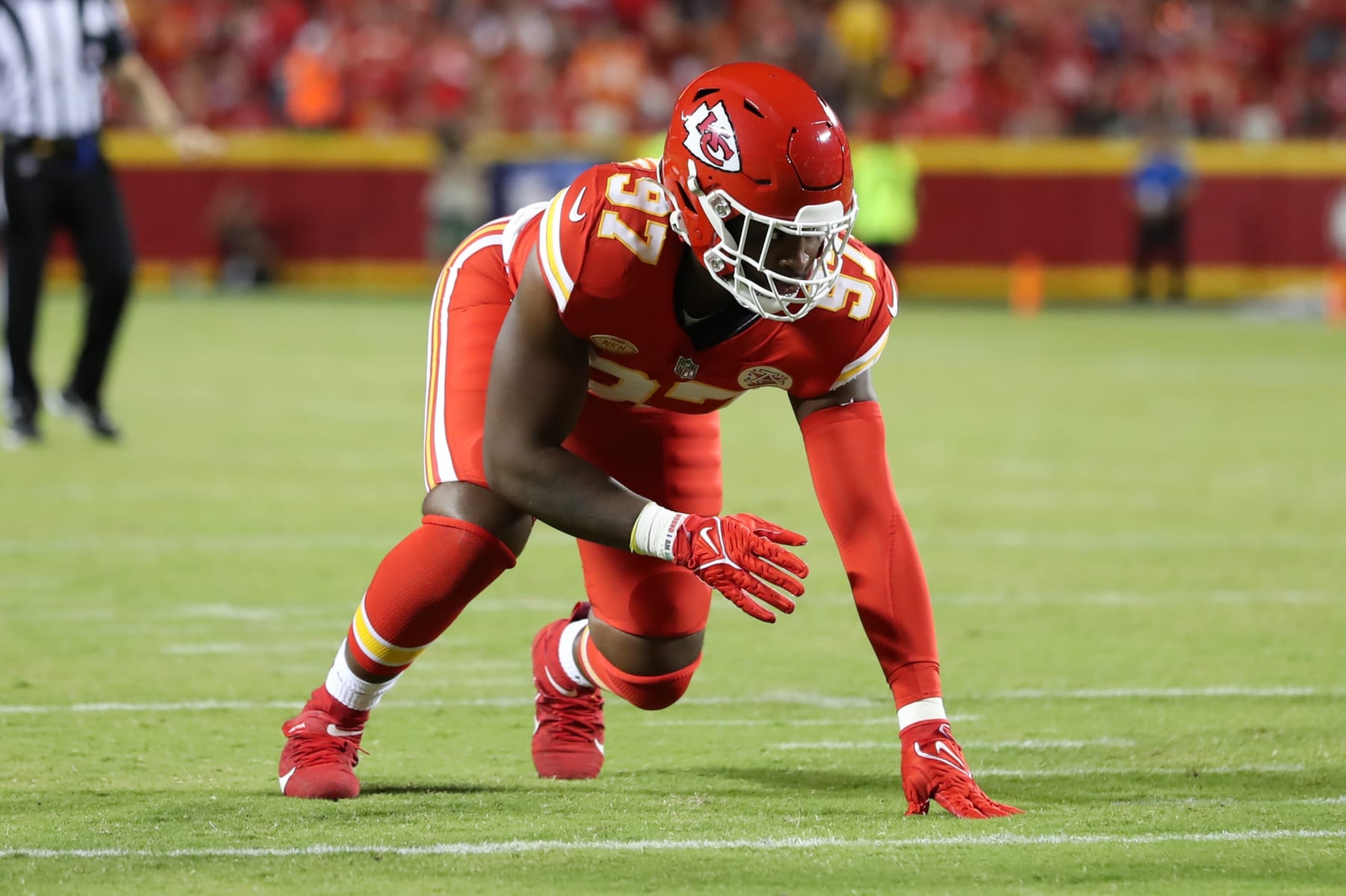KANSAS CITY, MO - OCTOBER 12: Kansas City Chiefs defensive end Felix Anudike-Uzomah (97) in a three-point stance in the second quarter of an AFC West matchup between the Denver Broncos and Kansas City Chiefs on Oct 12, 2023 at GEHA Field at Arrowhead Stadium in Kansas City, MO.  (Photo by Scott Winters/Icon Sportswire via Getty Images)