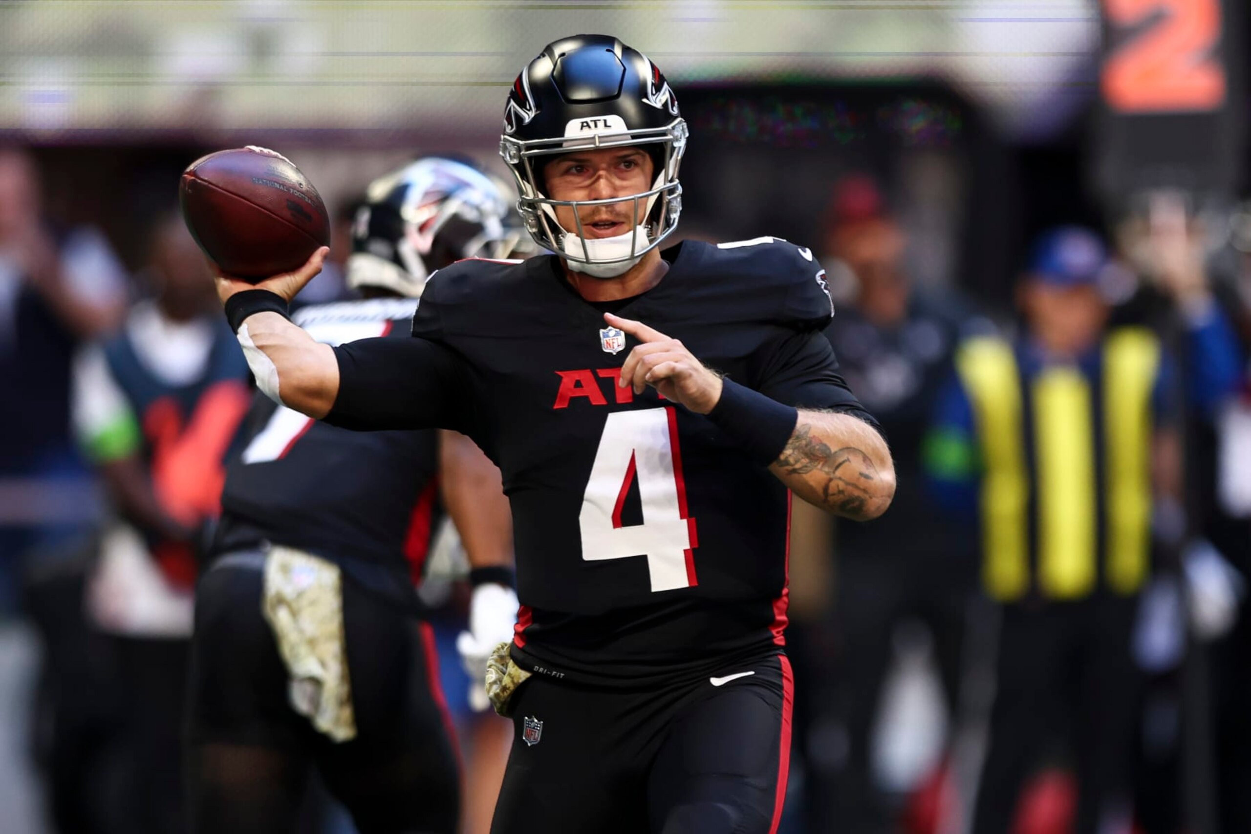 ATLANTA, GA - NOVEMBER 5: Taylor Heinicke #4 of the Atlanta Falcons throws a pass during the first quarter of an NFL football game against the Minnesota Vikings at Mercedes-Benz Stadium on November 5, 2023 in Atlanta, Georgia. (Photo by Kevin Sabitus/Getty Images)