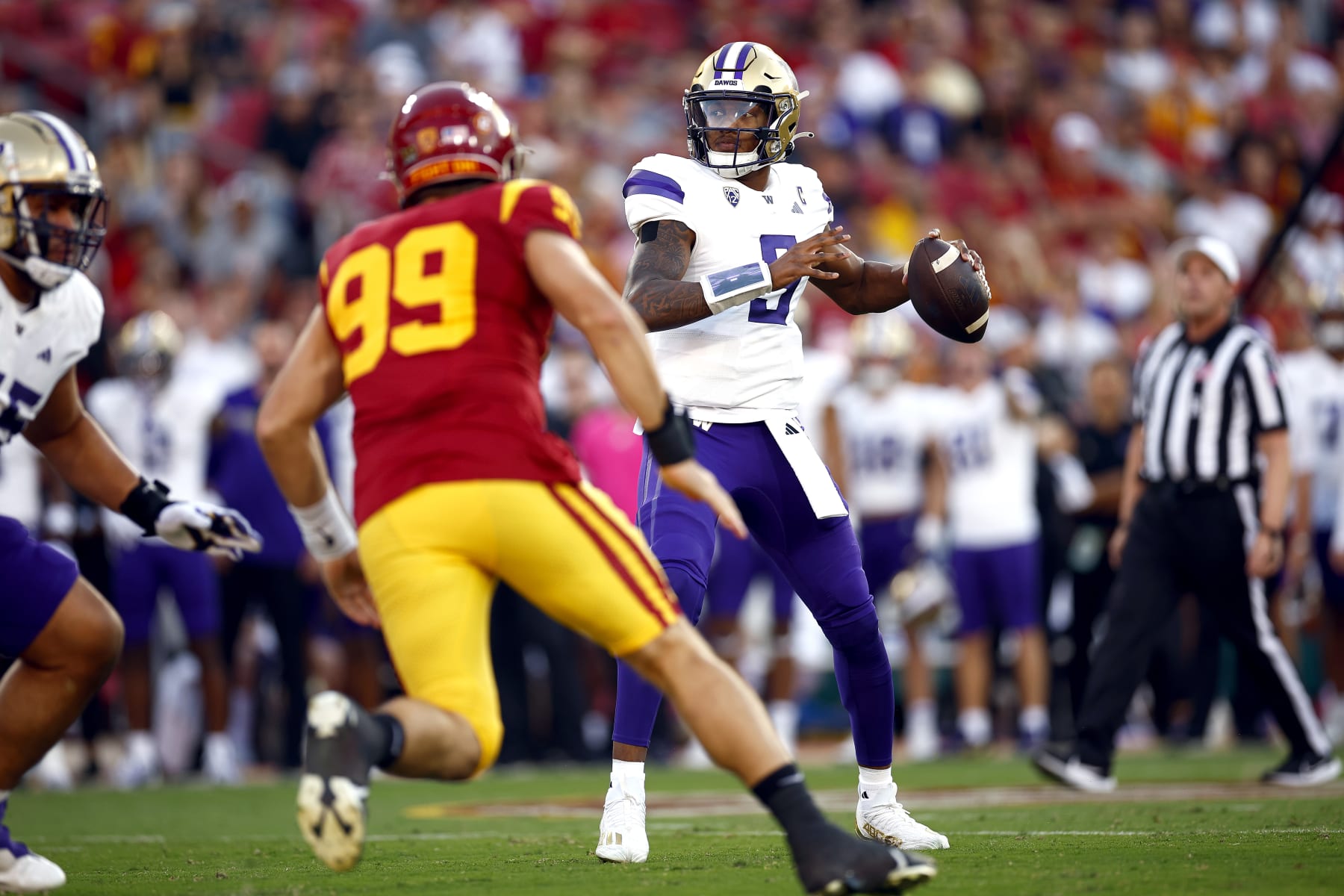 LOS ANGELES, CALIFORNIA - NOVEMBER 04: Michael Penix Jr. #9 of the Washington Huskies throws against the USC Trojans in the first quarter at United Airlines Field at the Los Angeles Memorial Coliseum on November 04, 2023 in Los Angeles, California. (Photo by Ronald Martinez/Getty Images) LOS ANGELES, CALIFORNIA - NOVEMBER 04: Michael Penix Jr. #9 of the Washington Huskies throws against the USC Trojans in the first quarter at United Airlines Field at the Los Angeles Memorial Coliseum on November 04, 2023 in Los Angeles, California. (Photo by Ronald Martinez/Getty Images)