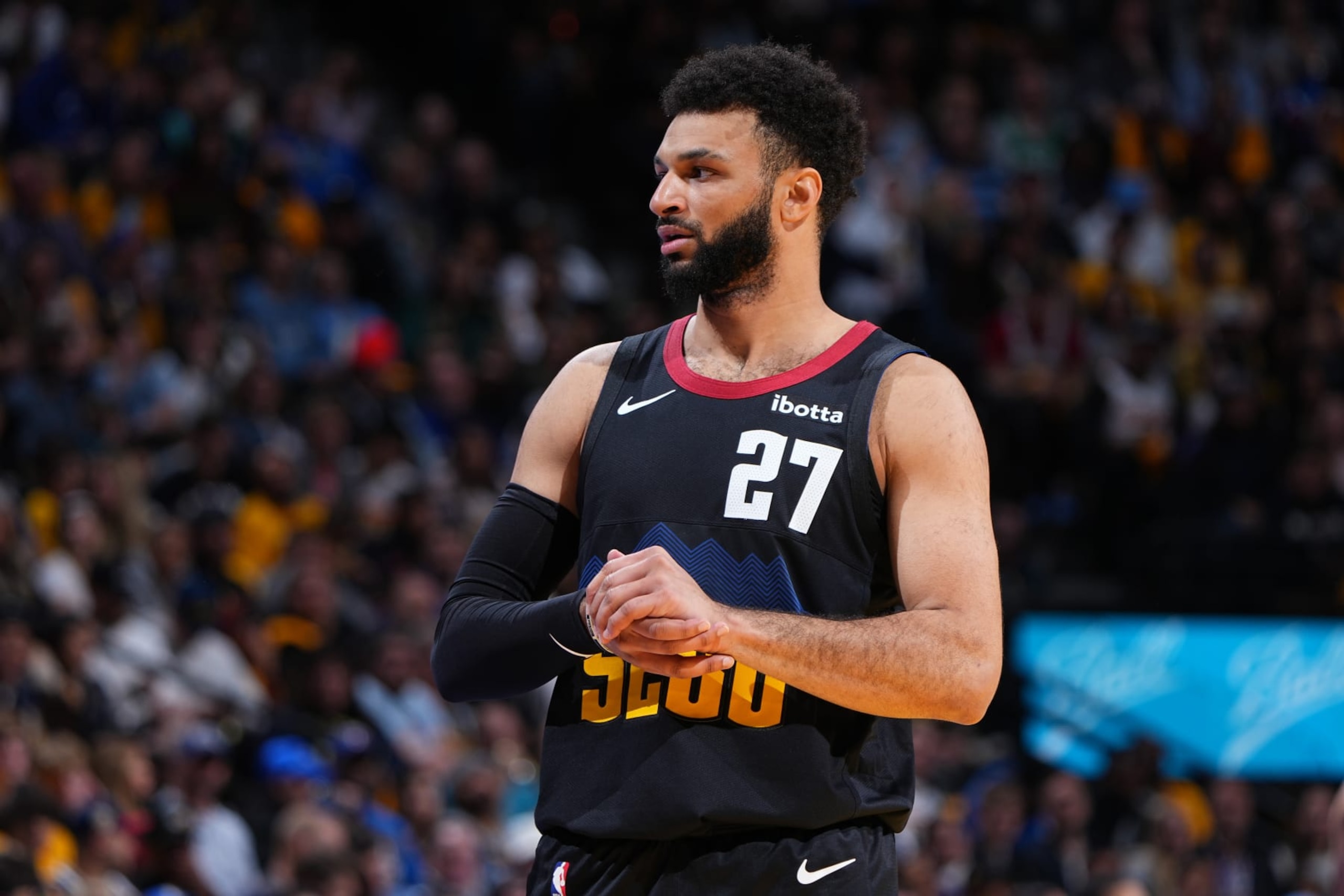 DENVER, CO - NOVEMBER 3: Jamal Murray #27 of the Denver Nuggets looks on during the game against the Dallas Mavericks during the In-Season Tournament on November 3, 2023 at the Ball Arena in Denver, Colorado. NOTE TO USER: User expressly acknowledges and agrees that, by downloading and/or using this Photograph, user is consenting to the terms and conditions of the Getty Images License Agreement. Mandatory Copyright Notice: Copyright 2023 NBAE (Photo by Garrett Ellwood/NBAE via Getty Images)