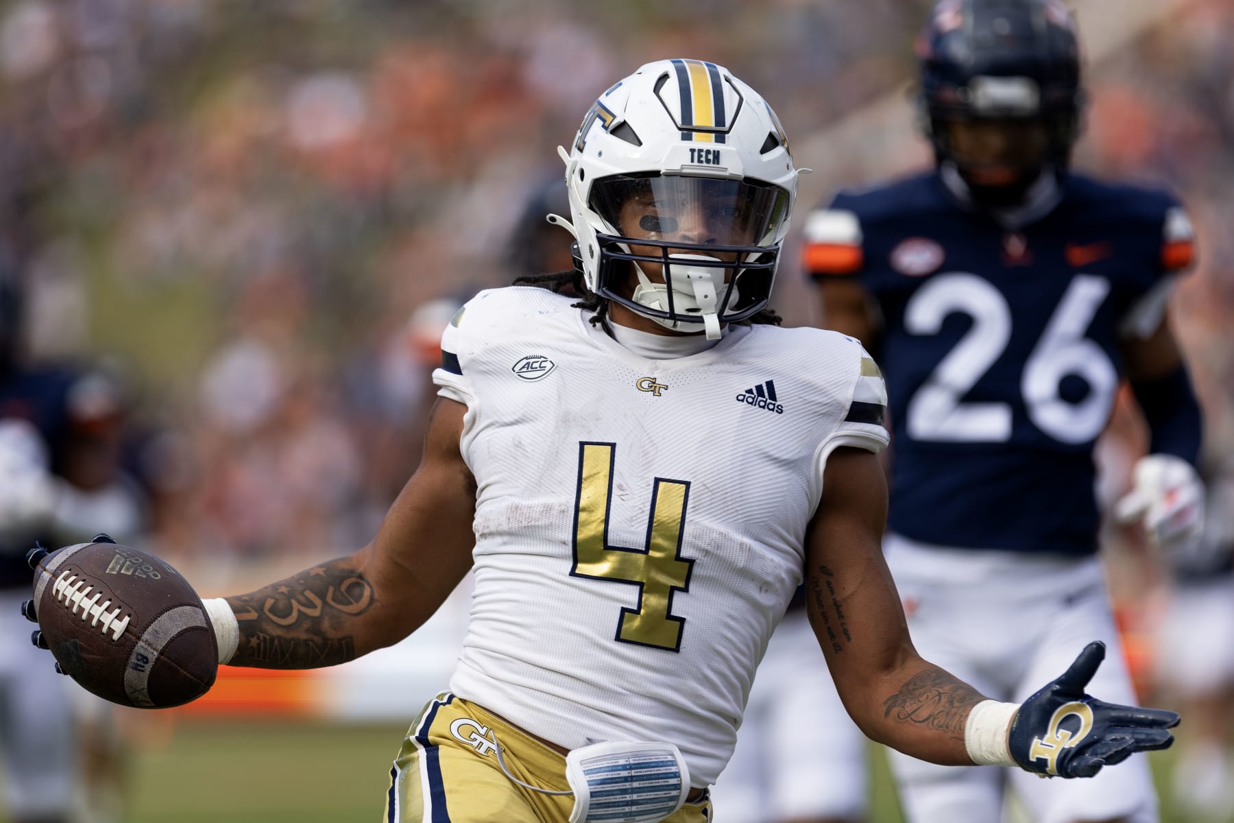 CHARLOTTESVILLE, VIRGINIA - NOVEMBER 4: Dontae Smith #4 of the Georgia Tech Yellow Jackets celebrates a touchdown in the first half during a game against the Virginia Cavaliers at Scott Stadium on November 4, 2023 in Charlottesville, Virginia. (Photo by Ryan M. Kelly/Getty Images)