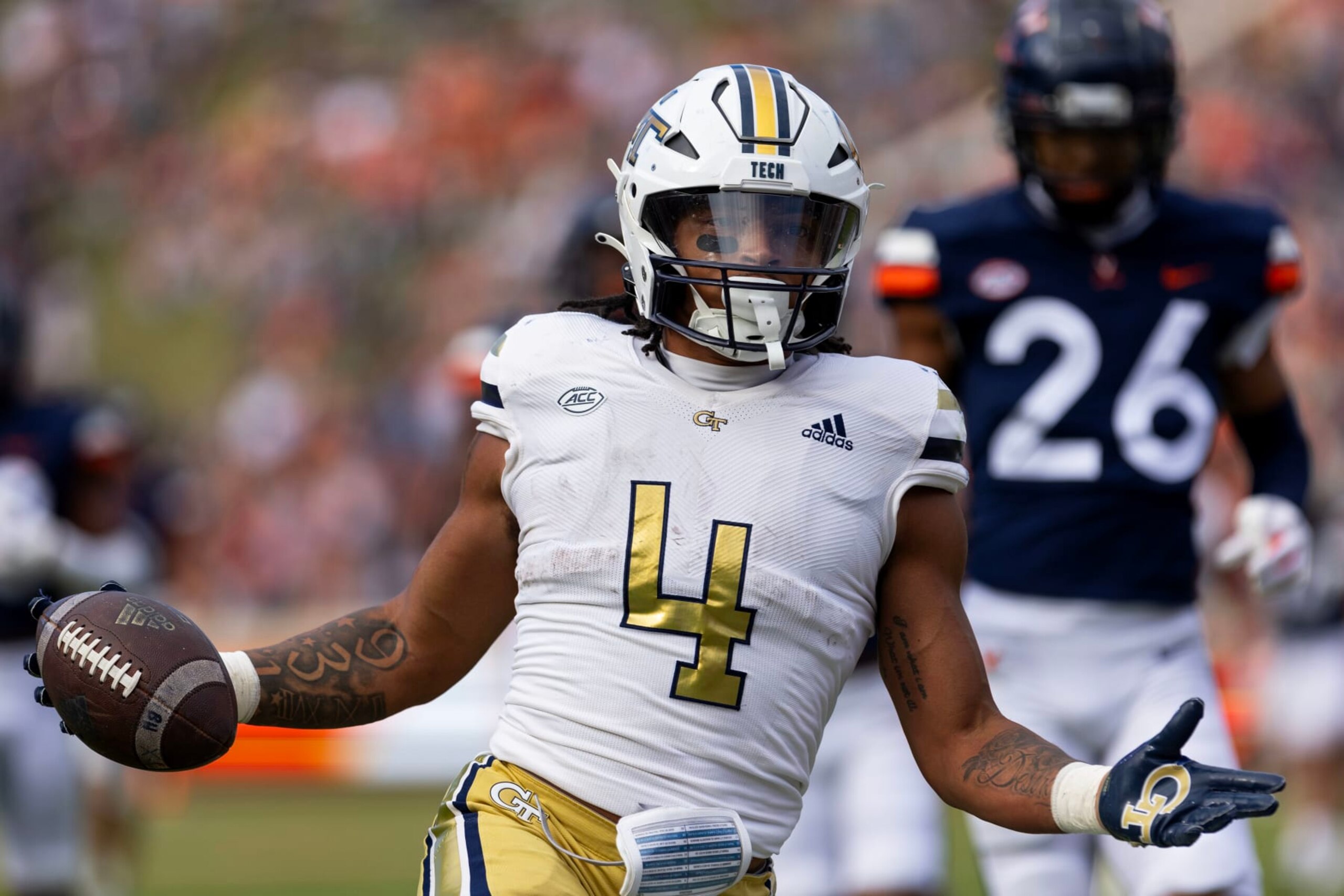 CHARLOTTESVILLE, VIRGINIA - NOVEMBER 4: Dontae Smith #4 of the Georgia Tech Yellow Jackets celebrates a touchdown in the first half during a game against the Virginia Cavaliers at Scott Stadium on November 4, 2023 in Charlottesville, Virginia. (Photo by Ryan M. Kelly/Getty Images)