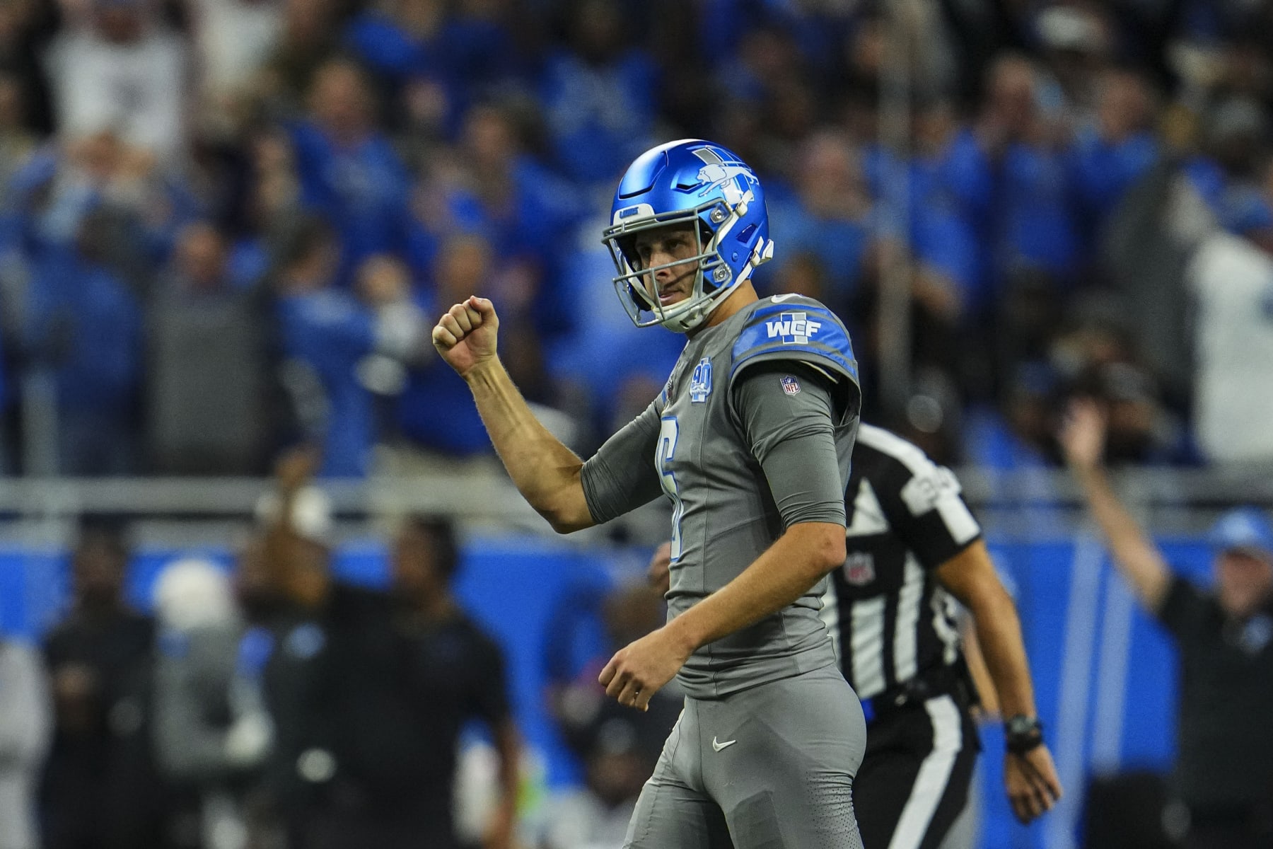 DETROIT, MI - OCTOBER 30: Jared Goff #16 of the Detroit Lions celebrates during an NFL game against the Las Vegas Raiders at Ford Field on October 30, 2023 in Detroit, Michigan. (Photo by Cooper Neill/Getty Images)