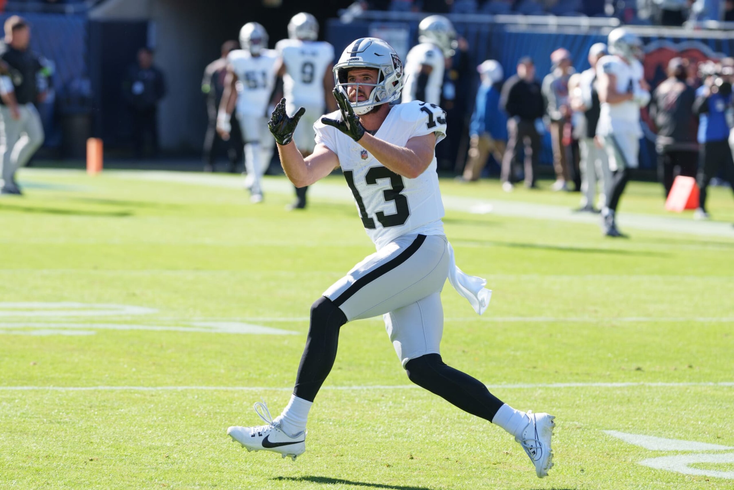 CHICAGO, IL - OCTOBER 22: Wide receiver Hunter Renfrow #13 of the Las Vegas Raiders warms up prior to an NFL football game against the Chicago Bears at Soldier Field on October 22, 2023 in Chicago, IL. (Photo by Todd Rosenberg/Getty Images) CHICAGO, IL - OCTOBER 22: Wide receiver Hunter Renfrow #13 of the Las Vegas Raiders warms up prior to an NFL football game against the Chicago Bears at Soldier Field on October 22, 2023 in Chicago, IL. (Photo by Todd Rosenberg/Getty Images)