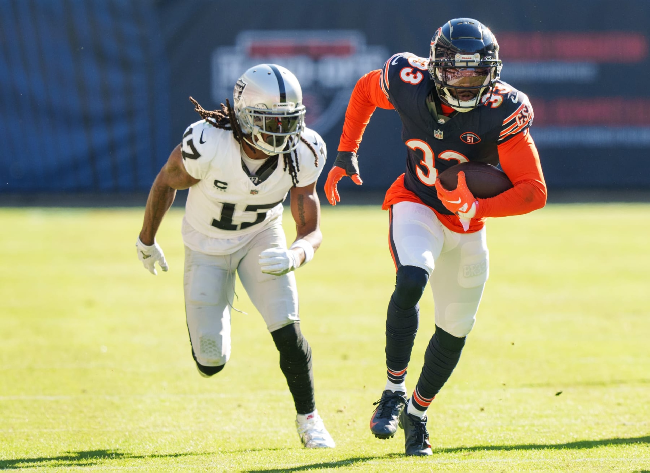 CHICAGO, IL - OCTOBER 22: Cornerback Jaylon Johnson #33 of the Chicago Bears heads for the end zone after intercepting a pass intended for Wide receiver Davante Adams #17 of the Las Vegas Raiders during an NFL football at Soldier Field on October 22, 2023 in Chicago, Illinois. (Photo by Todd Rosenberg/Getty Images) CHICAGO, IL - OCTOBER 22: Cornerback Jaylon Johnson #33 of the Chicago Bears heads for the end zone after intercepting a pass intended for Wide receiver Davante Adams #17 of the Las Vegas Raiders during an NFL football at Soldier Field on October 22, 2023 in Chicago, Illinois. (Photo by Todd Rosenberg/Getty Images)