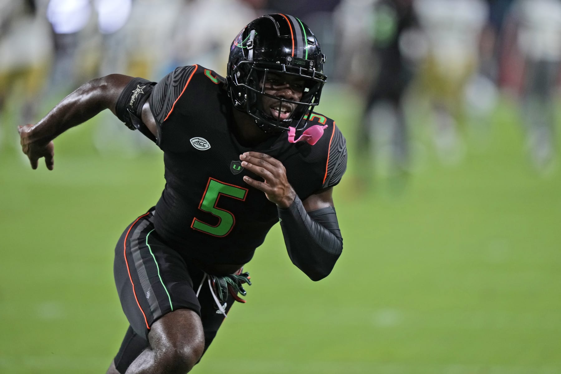 Miami safety Kamren Kinchens warms up before the start of an NCAA college football game against Georgia Tech, Saturday, Oct. 7, 2023, in Miami Gardens, Fla. (AP Photo/Wilfredo Lee)