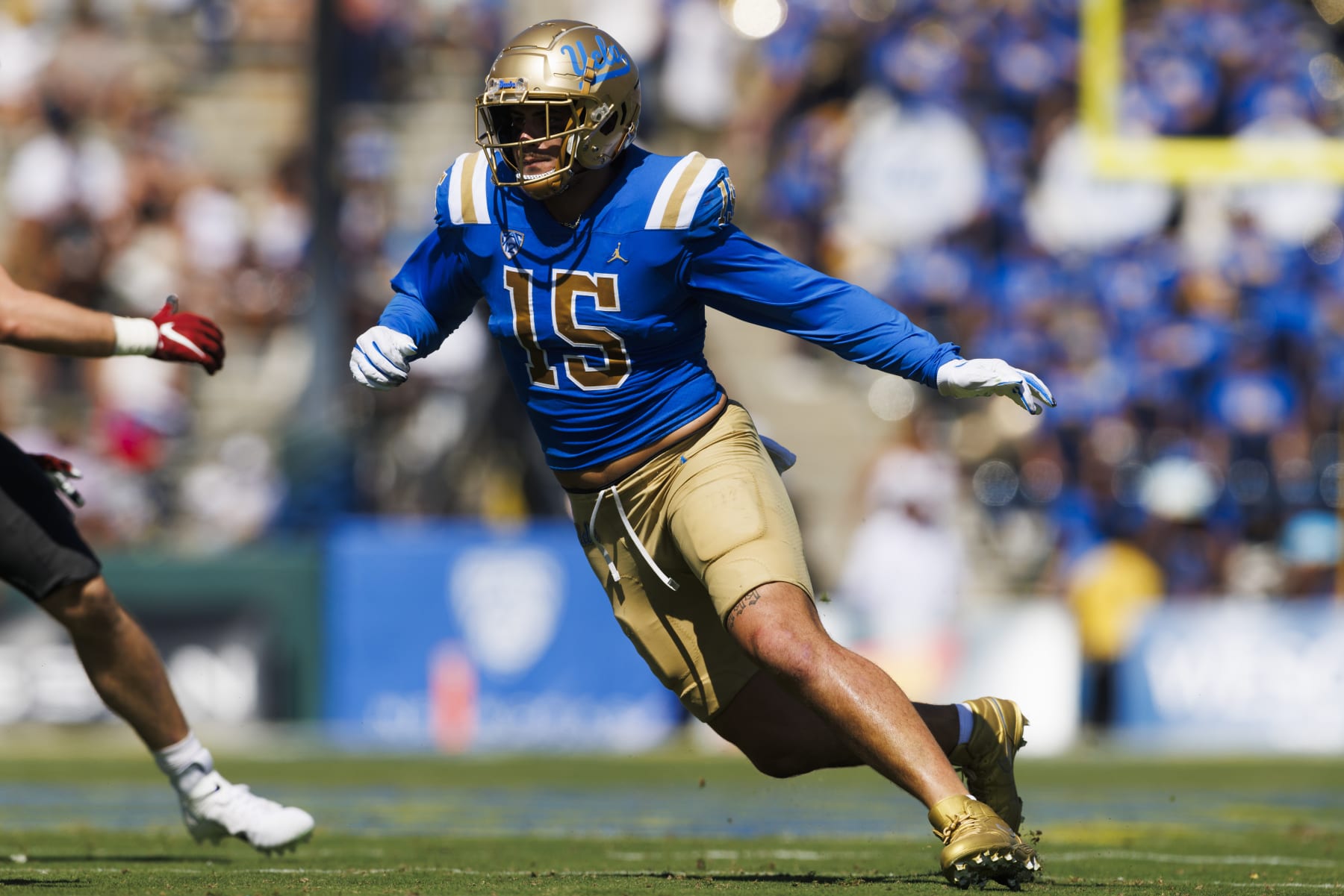 PASADENA, CA - OCTOBER 07: UCLA Bruins defensive lineman Laiatu Latu (15) rushes the edge during the college football game against the Washington State Cougars on October 7, 2023 at Rose Bowl Stadium in Pasadena, CA. (Photo by Ric Tapia/Icon Sportswire via Getty Images)