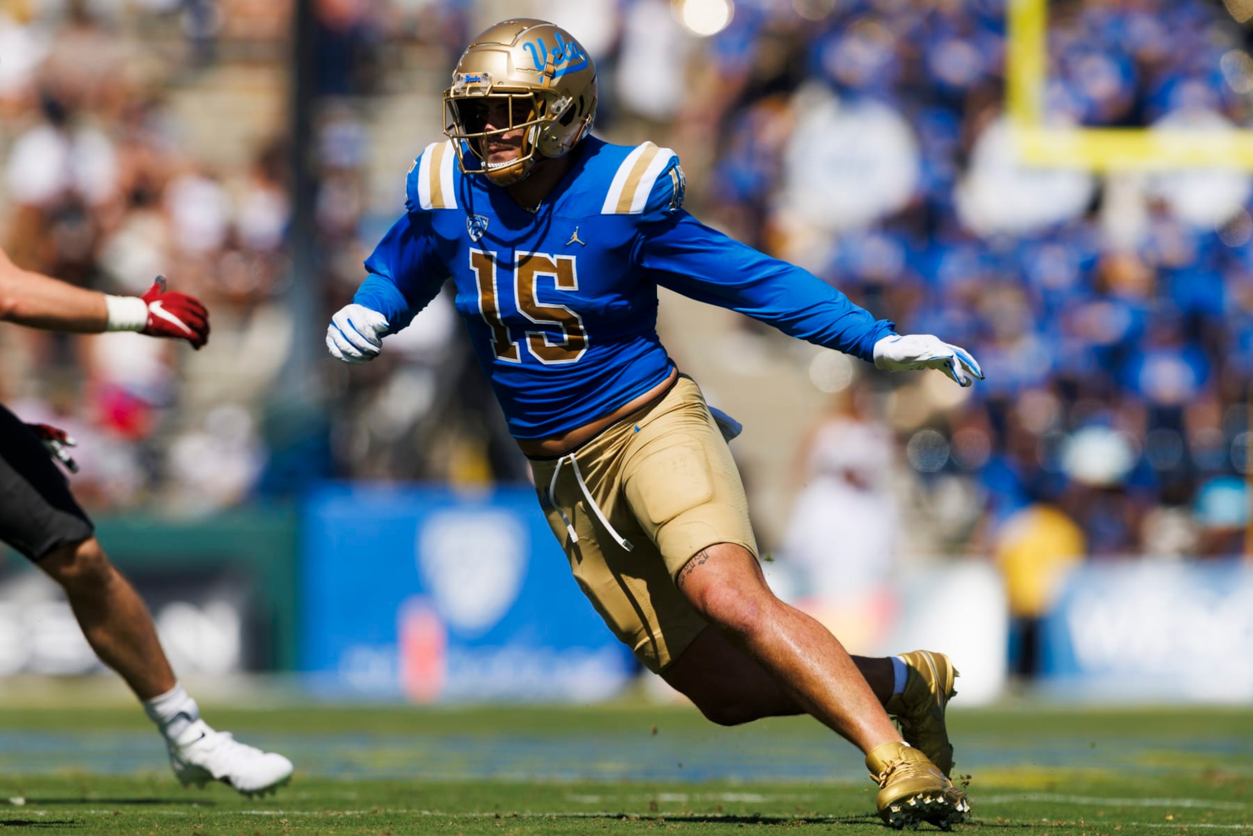 PASADENA, CA - OCTOBER 07: UCLA Bruins defensive lineman Laiatu Latu (15) rushes the edge during the college football game against the Washington State Cougars on October 7, 2023 at Rose Bowl Stadium in Pasadena, CA. (Photo by Ric Tapia/Icon Sportswire via Getty Images)