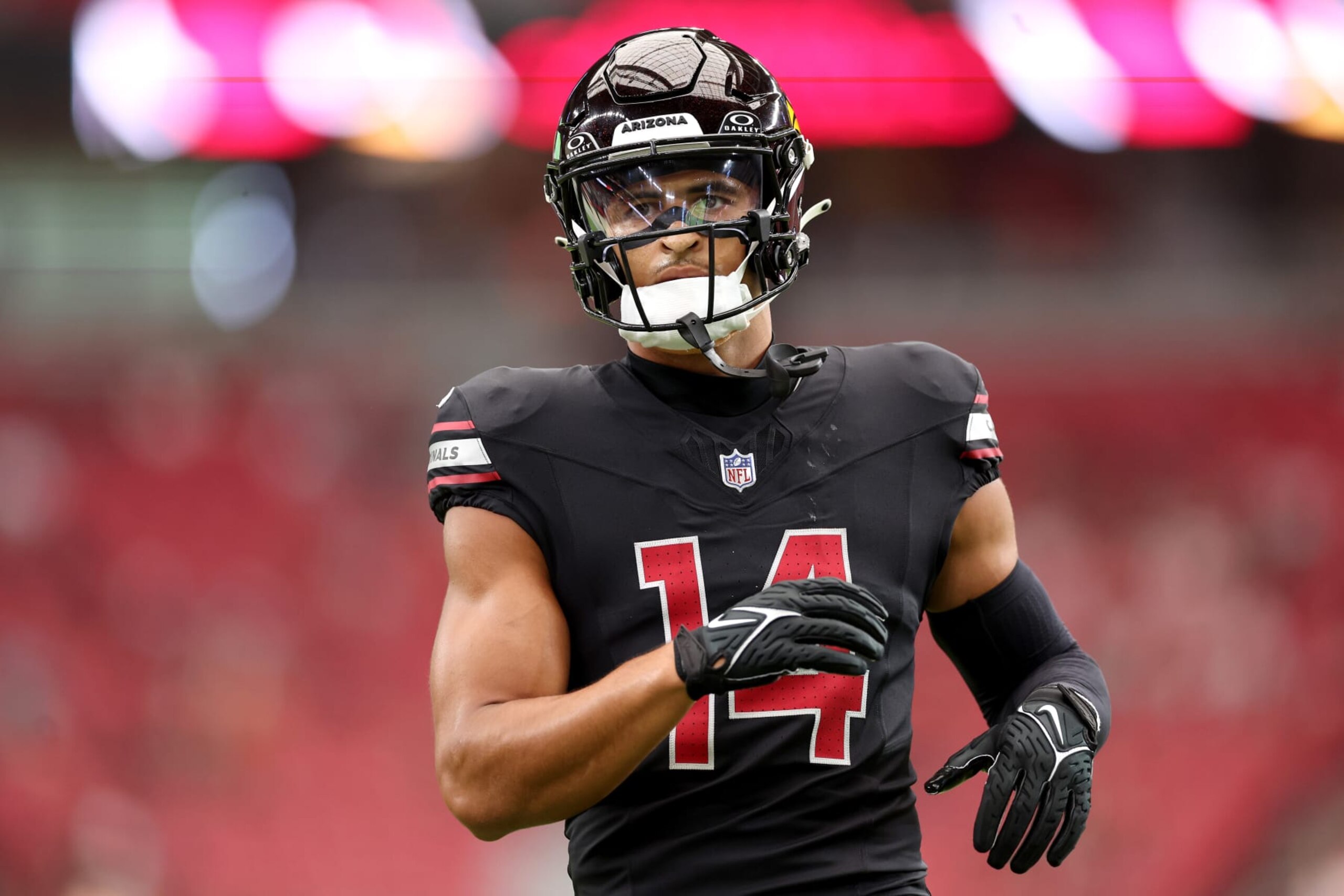 GLENDALE, ARIZONA - OCTOBER 08: Michael Wilson #14 of the Arizona Cardinals warms up prior to the game against the Cincinnati Bengals at State Farm Stadium on October 08, 2023 in Glendale, Arizona. (Photo by Christian Petersen/Getty Images)