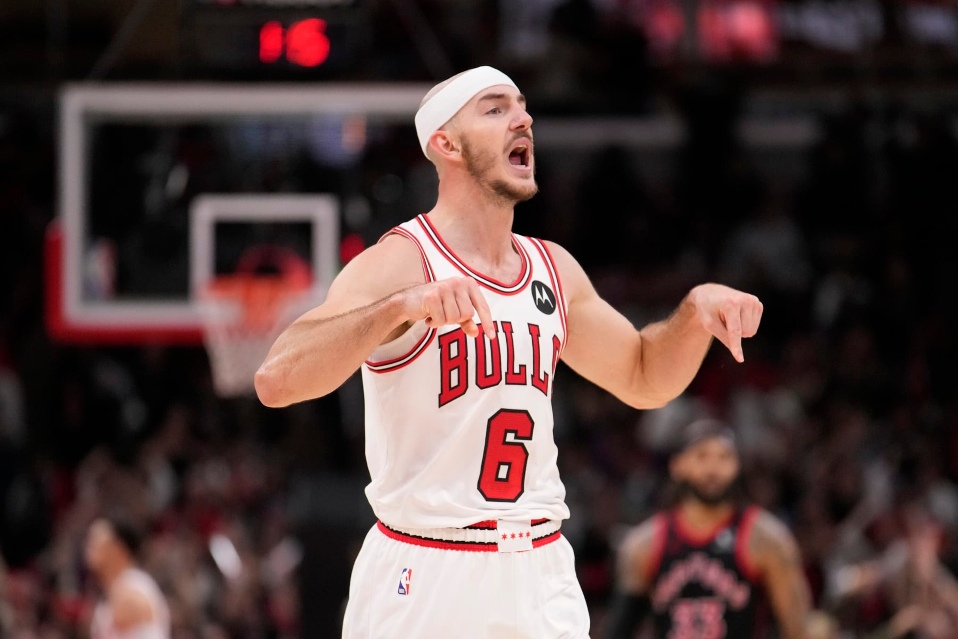 Chicago Bulls' Alex Caruso celebrates his three-point basket with just seconds remaining during an NBA basketball game against the Toronto Raptors Friday, Oct. 27, 2023, in Chicago. (AP Photo/Charles Rex Arbogast) Chicago Bulls' Alex Caruso celebrates his three-point basket with just seconds remaining during an NBA basketball game against the Toronto Raptors Friday, Oct. 27, 2023, in Chicago. (AP Photo/Charles Rex Arbogast)