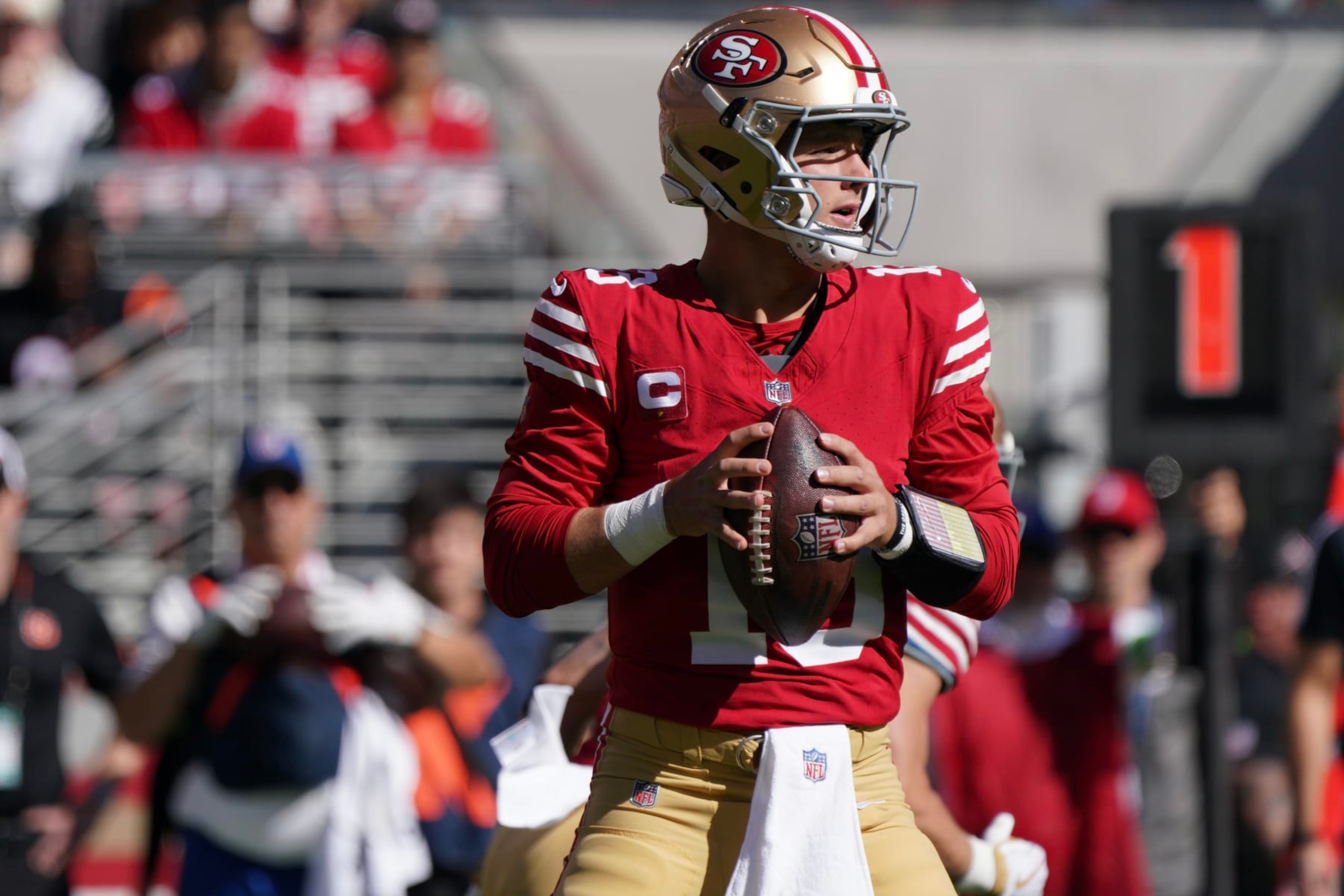 SANTA CLARA, CALIFORNIA - OCTOBER 29: Brock Purdy #13 of the San Francisco 49ers looks to throw the ball during the first quarter against the Cincinnati Bengals at Levi's Stadium on October 29, 2023 in Santa Clara, California. (Photo by Loren Elliott/Getty Images)