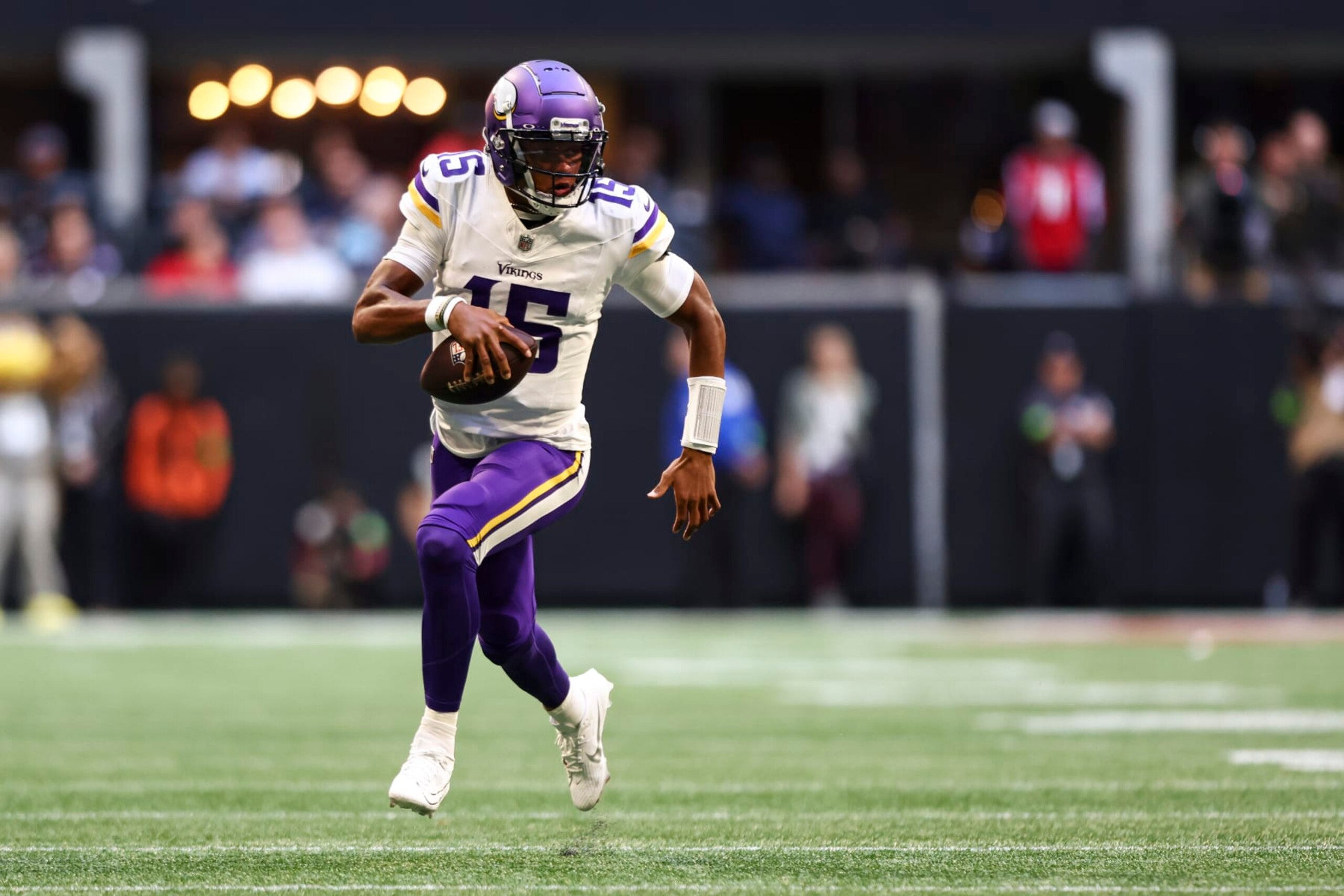 ATLANTA, GA - NOVEMBER 5: Joshua Dobbs #15 of the Minnesota Vikings carries the ball during the third quarter of an NFL football game against the Atlanta Falcons at Mercedes-Benz Stadium on November 5, 2023 in Atlanta, Georgia. (Photo by Kevin Sabitus/Getty Images)