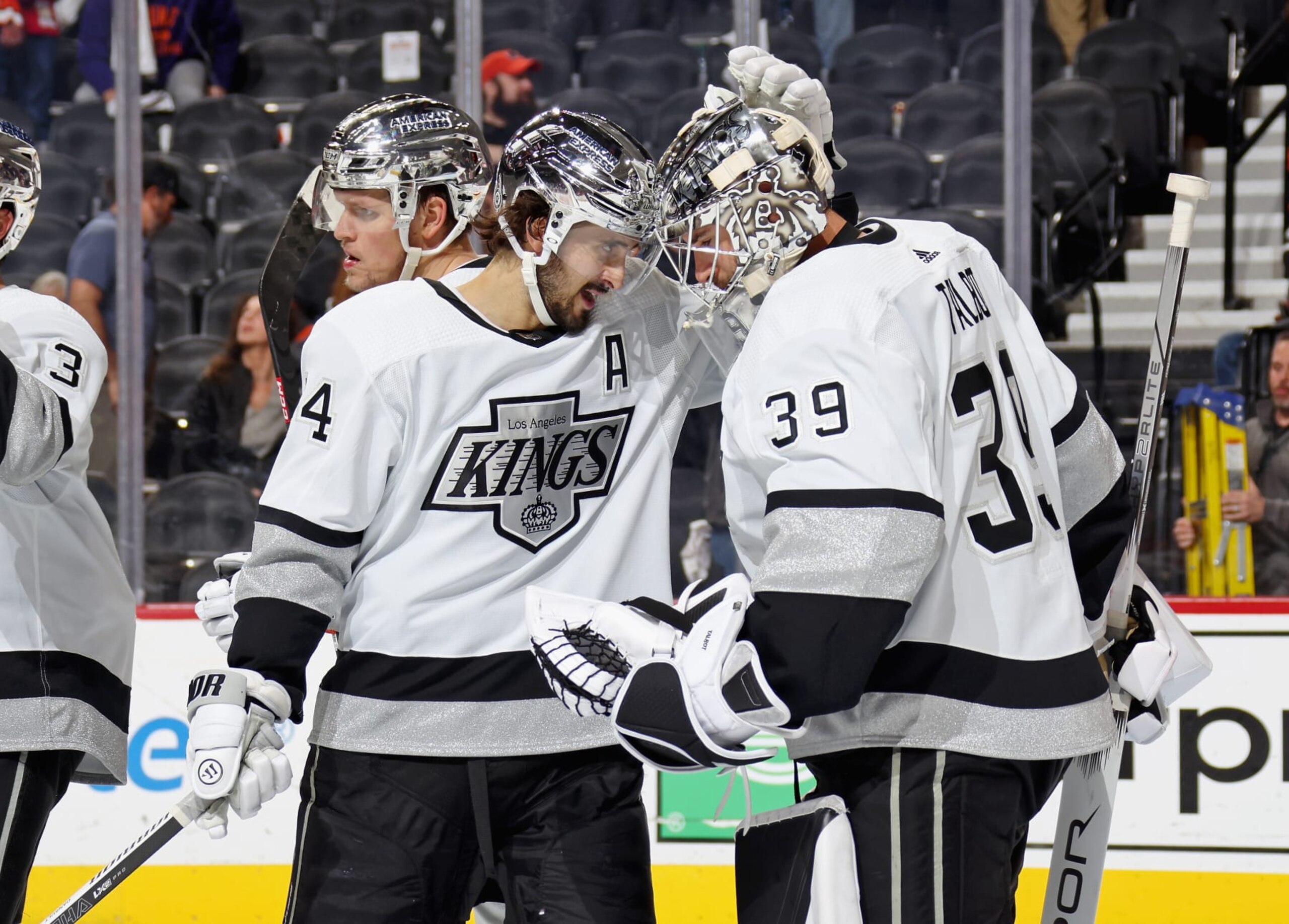 PHILADELPHIA, PENNSYLVANIA - NOVEMBER 04: Phillip Danault #24 and Cam Talbot #39 of the Los Angeles Kings celebrate after defeating the Philadelphia Flyers 5-0 at the Wells Fargo Center on November 4, 2023 in Philadelphia, Pennsylvania.  (Photo by Len Redkoles/NHLI via Getty Images)