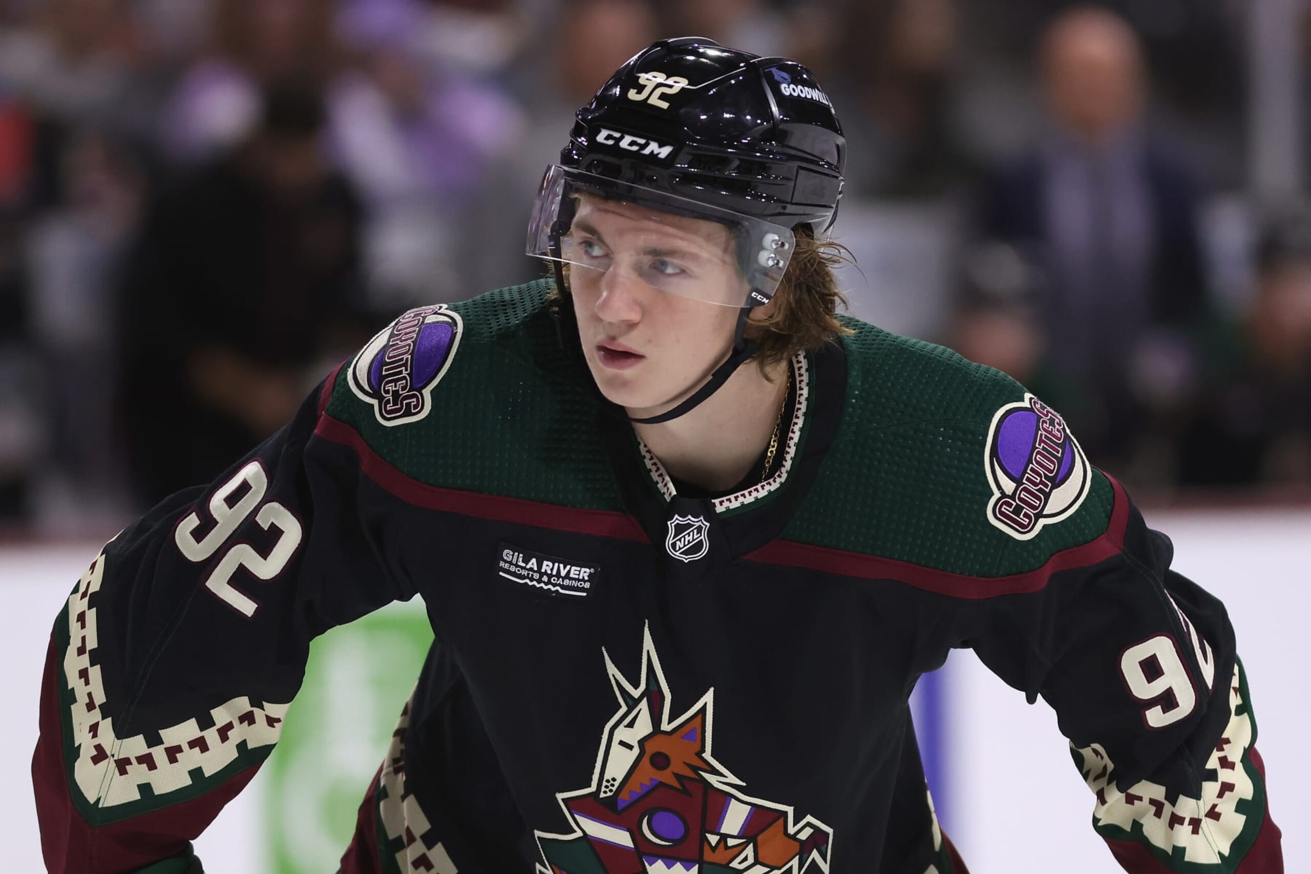 TEMPE, ARIZONA - OCTOBER 27: Logan Cooley #92 of the Arizona Coyotes awaits a faceoff against the Los Angeles Kings during the second period of the NHL game at Mullett Arena on October 27, 2023 in Tempe, Arizona. (Photo by Christian Petersen/Getty Images)