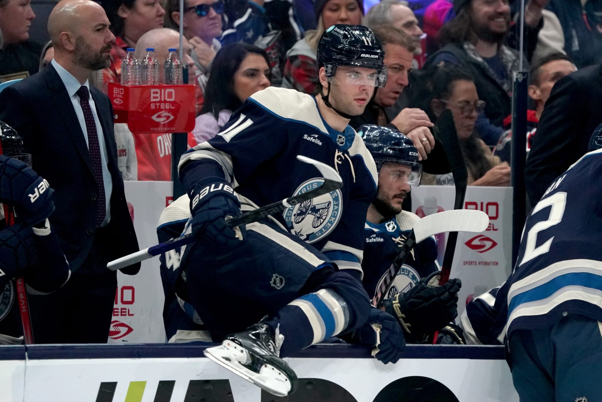 COLUMBUS, OHIO - OCTOBER 28: Adam Fantilli #11 of the Columbus Blue Jackets climbs over the boards before the start of the first period against the New York Islanders at Nationwide Arena on October 28, 2023 in Columbus, Ohio. (Photo by Jason Mowry/Getty Images)