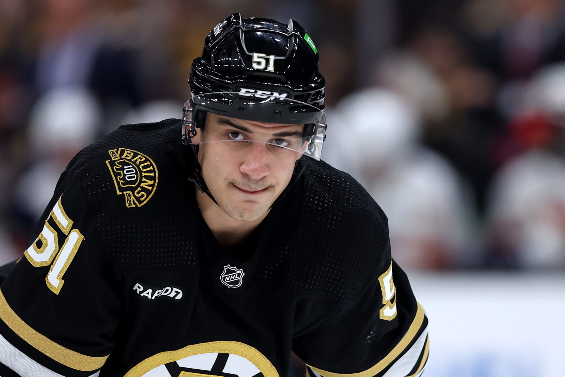 BOSTON, MASSACHUSETTS - OCTOBER 30: Matthew Poitras #51 of the Boston Bruins looks on during the second period against the Florida Panthers at TD Garden on October 30, 2023 in Boston, Massachusetts. (Photo by Maddie Meyer/Getty Images)