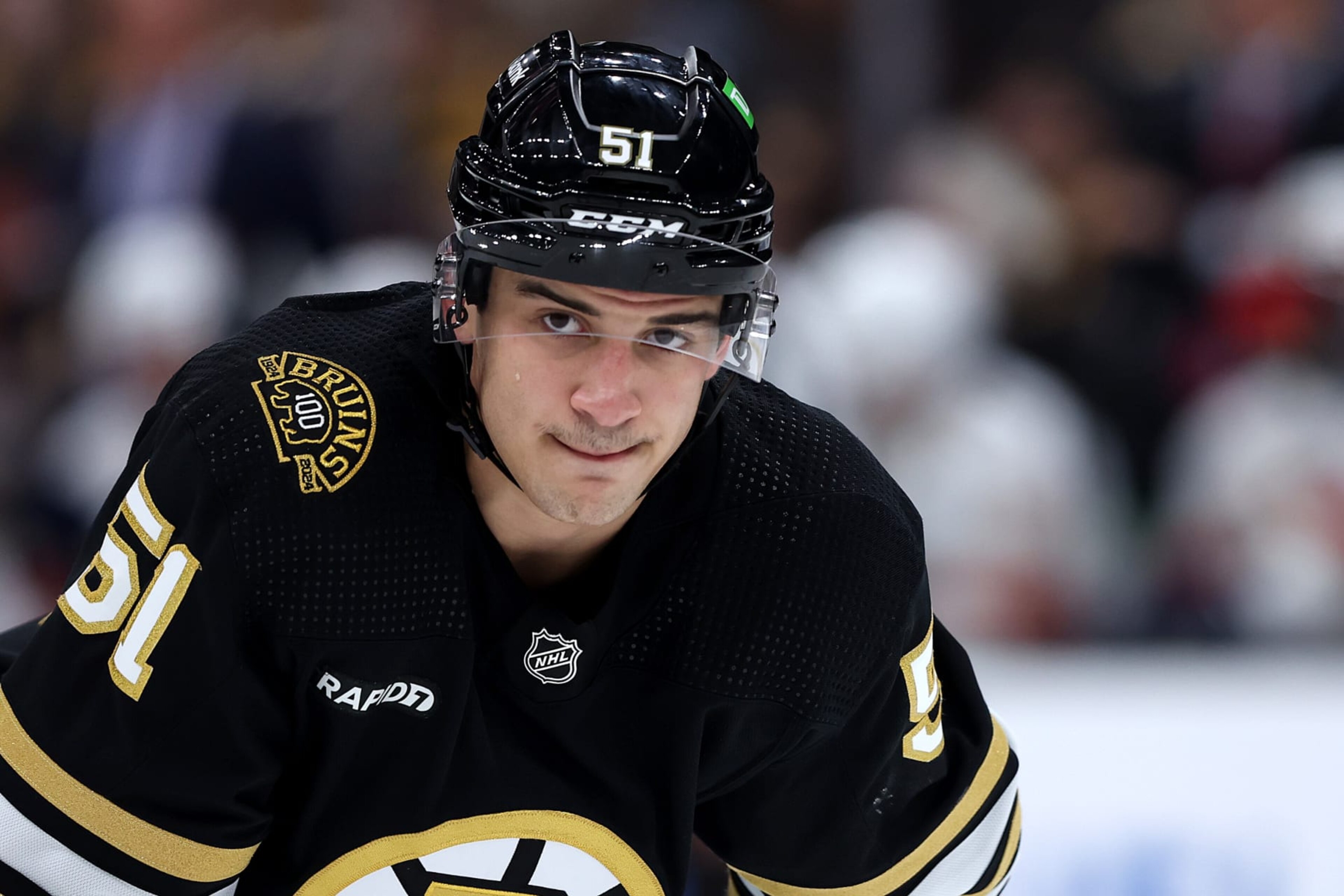 BOSTON, MASSACHUSETTS - OCTOBER 30: Matthew Poitras #51 of the Boston Bruins looks on during the second period against the Florida Panthers at TD Garden on October 30, 2023 in Boston, Massachusetts. (Photo by Maddie Meyer/Getty Images) BOSTON, MASSACHUSETTS - OCTOBER 30: Matthew Poitras #51 of the Boston Bruins looks on during the second period against the Florida Panthers at TD Garden on October 30, 2023 in Boston, Massachusetts. (Photo by Maddie Meyer/Getty Images)