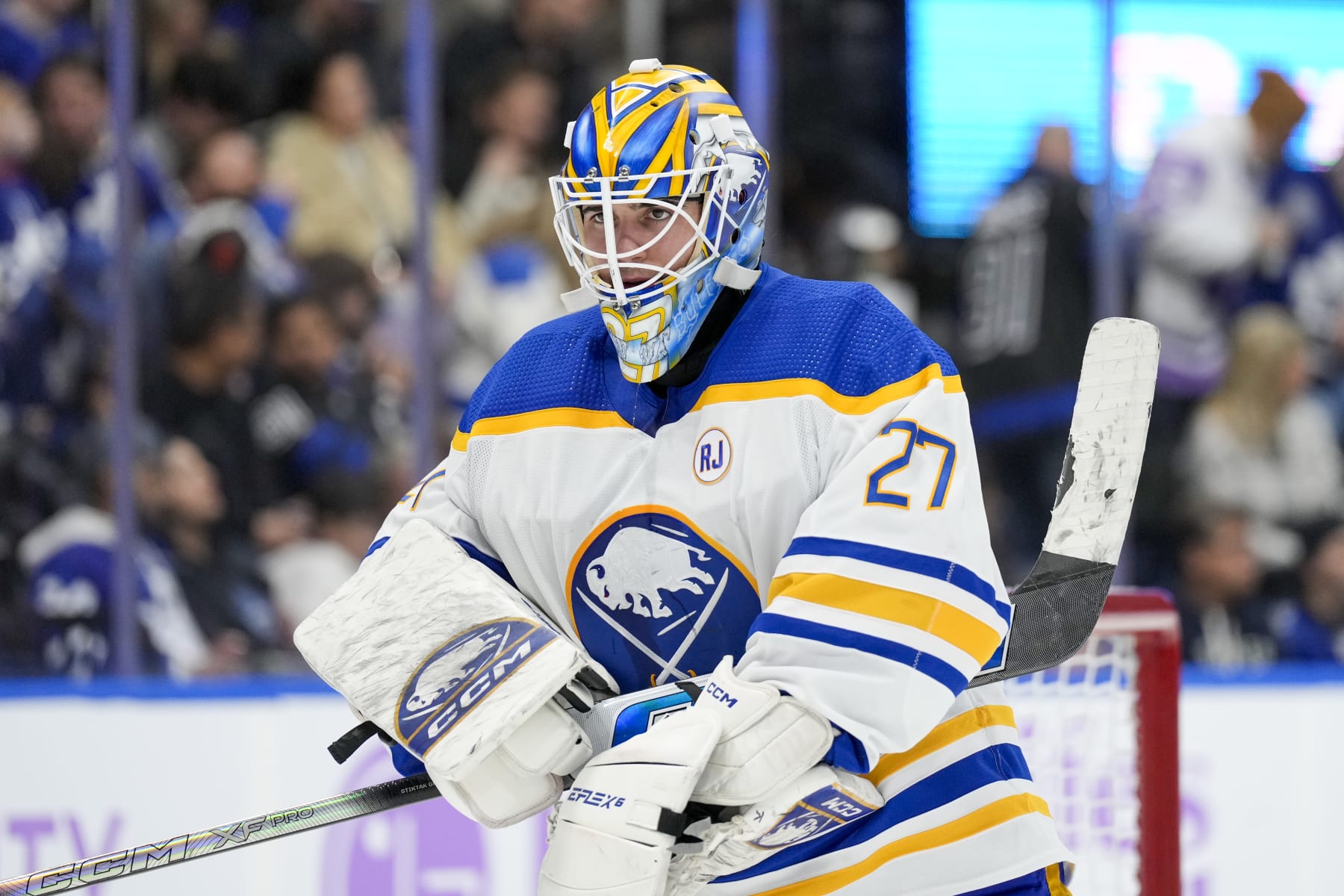 TORONTO, ON - NOVEMBER 4: Devon Levi #27 of the Buffalo Sabres looks on against the Toronto Maple Leafs during the second period at the Scotiabank Arena on November 4, 2023 in Toronto, Ontario, Canada. (Photo by Kevin Sousa/NHLI via Getty Images)