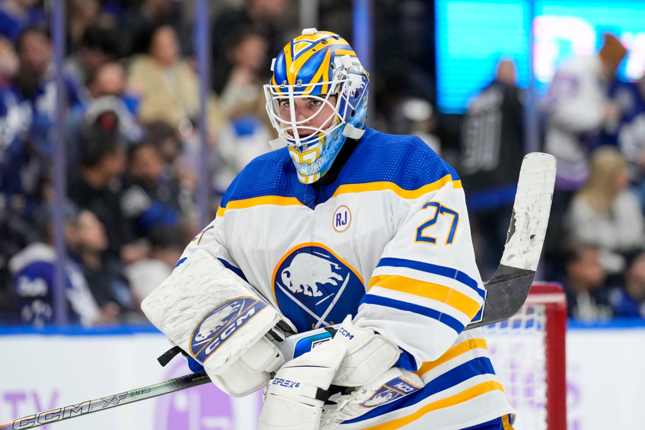 TORONTO, ON - NOVEMBER 4: Devon Levi #27 of the Buffalo Sabres looks on against the Toronto Maple Leafs during the second period at the Scotiabank Arena on November 4, 2023 in Toronto, Ontario, Canada. (Photo by Kevin Sousa/NHLI via Getty Images)