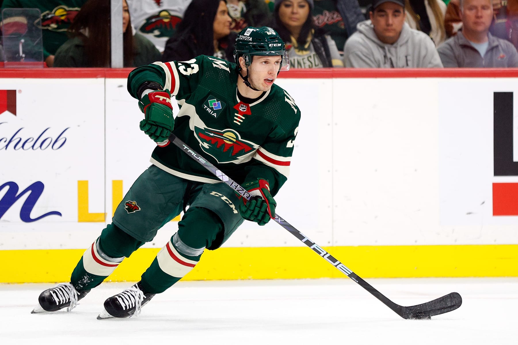ST PAUL, MINNESOTA - OCTOBER 24: Marco Rossi #23 of the Minnesota Wild skates with the puck in the first period against the Edmonton Oilers at Xcel Energy Center on October 24, 2023 in St Paul, Minnesota. (Photo by David Berding/Getty Images)