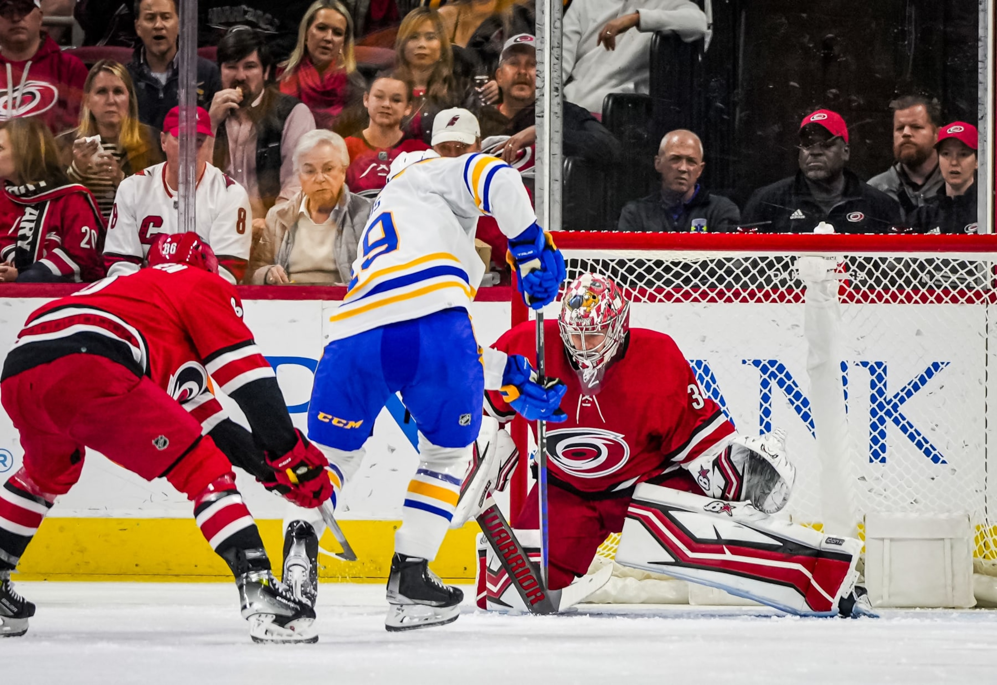 RALEIGH, NORTH CAROLINA - NOVEMBER 07: Antti Raanta #32 of the Carolina Hurricanes makes a save against Peyton Krebs #19 of the Buffalo Sabres during the first period at PNC Arena on November 07, 2023 in Raleigh, North Carolina. (Photo by Josh Lavallee/NHLI via Getty Images) RALEIGH, NORTH CAROLINA - NOVEMBER 07: Antti Raanta #32 of the Carolina Hurricanes makes a save against Peyton Krebs #19 of the Buffalo Sabres during the first period at PNC Arena on November 07, 2023 in Raleigh, North Carolina. (Photo by Josh Lavallee/NHLI via Getty Images)