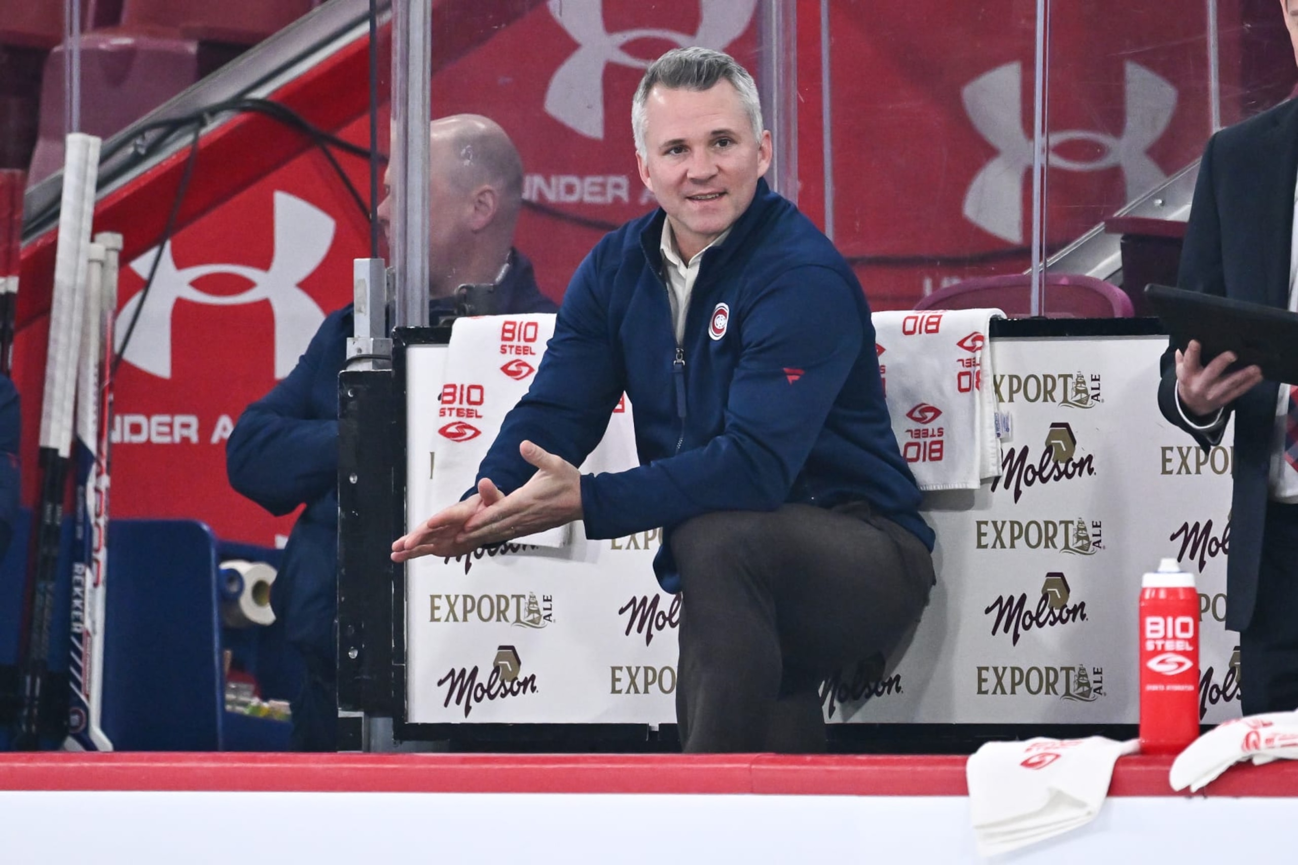 MONTREAL, CANADA - MARCH 21:  Head coach of the Montreal Canadiens Martin St-Louis watches the warm-ups from the bench against the Tampa Bay Lightning at Centre Bell on March 21, 2023 in Montreal, Quebec, Canada.  The Montreal Canadiens defeated the Tampa Bay Lightning 3-2.  (Photo by Minas Panagiotakis/Getty Images)