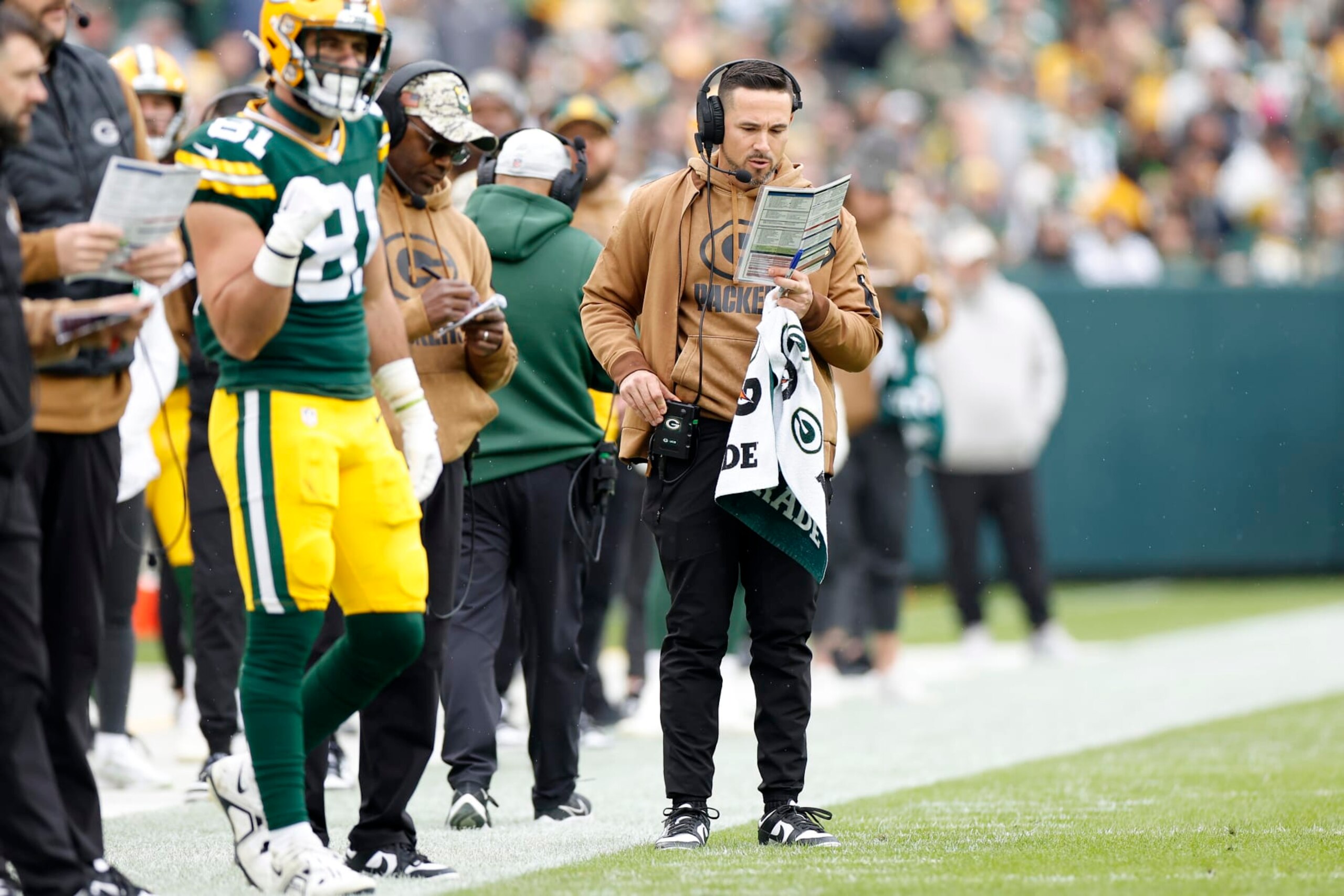 GREEN BAY, WISCONSIN - NOVEMBER 05: Head coach Matt LaFleur of the Green Bay Packers looks over a play sheet in the first quarter of a game against the Los Angeles Rams at Lambeau Field on November 05, 2023 in Green Bay, Wisconsin. (Photo by John Fisher/Getty Images)