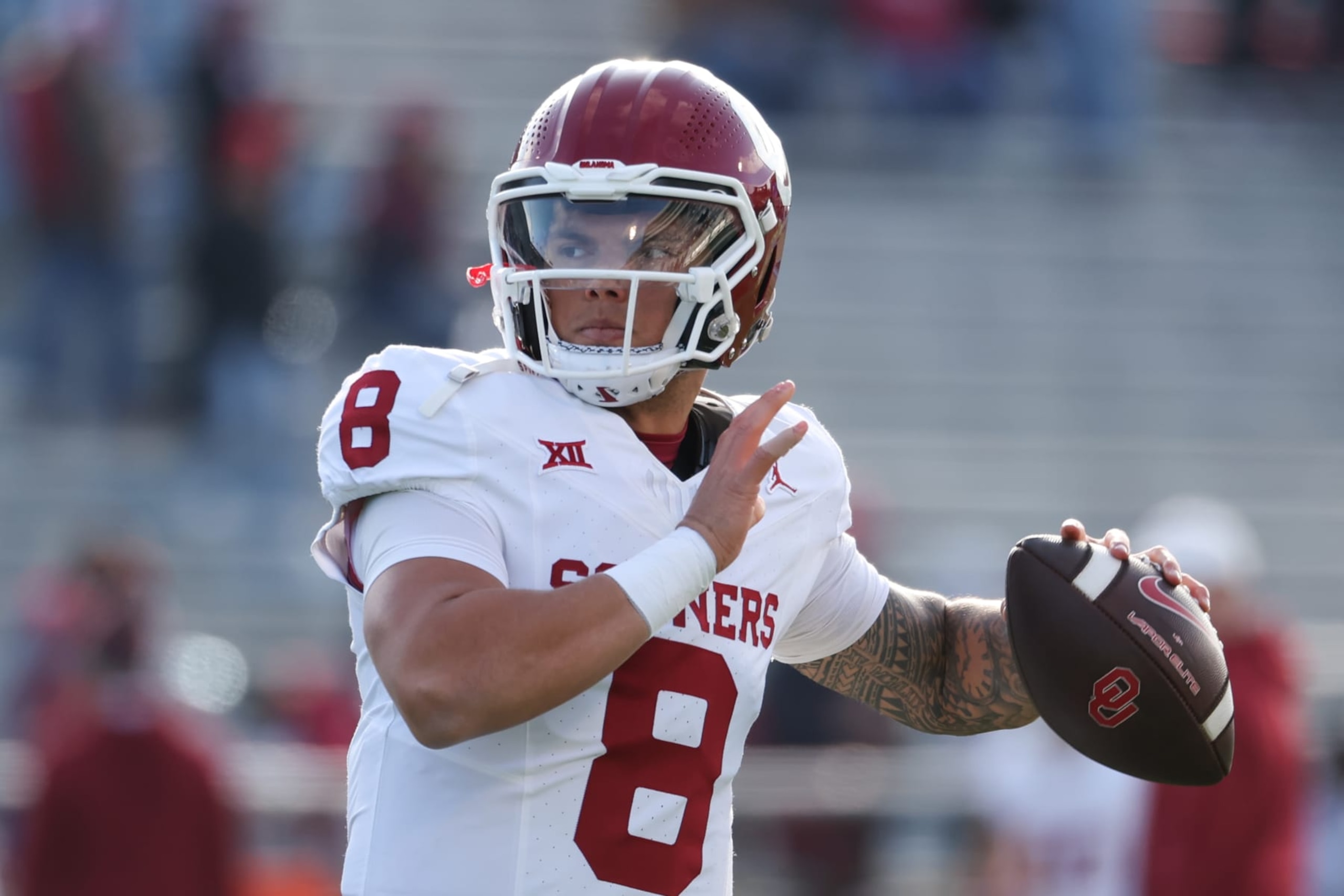 LAWRENCE, KS - OCTOBER 28: Oklahoma Sooners quarterback Dillon Gabriel (8) throws a pass before a Big 12 football game between the Oklahoma Sooners and Kansas Jayhawks on Oct 28, 2023 at Memorial Stadium in Lawrence, KS.  (Photo by Scott Winters/Icon Sportswire via Getty Images)
