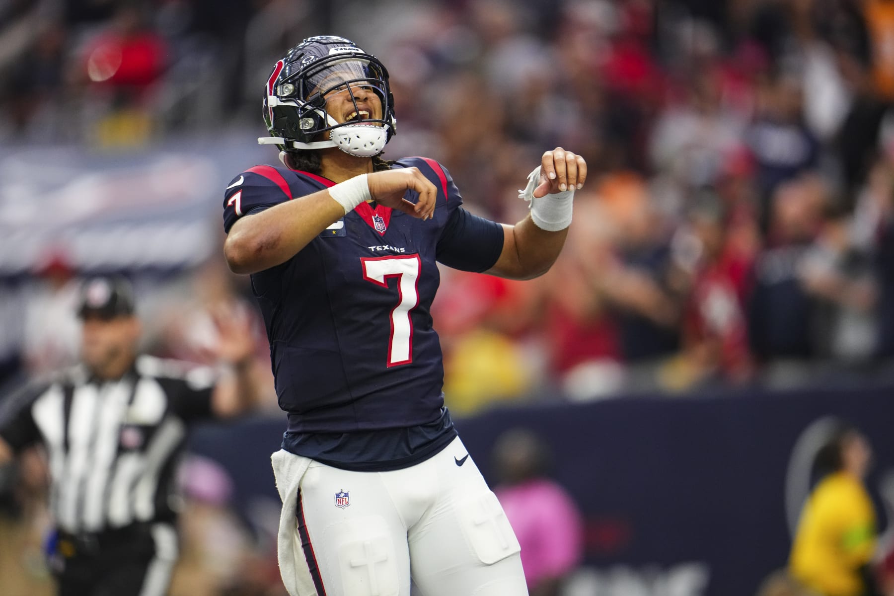 HOUSTON, TX - NOVEMBER 05: C.J. Stroud #7 of the Houston Texans celebrates during an NFL football game against the Tampa Bay Buccaneers at NRG Stadium on November 5, 2023 in Houston, Texas. (Photo by Cooper Neill/Getty Images)