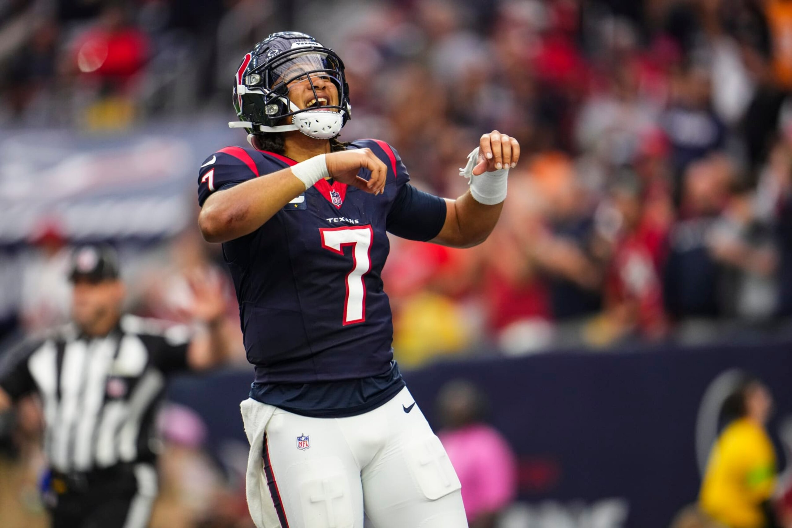 HOUSTON, TX - NOVEMBER 05: C.J. Stroud #7 of the Houston Texans celebrates during an NFL football game against the Tampa Bay Buccaneers at NRG Stadium on November 5, 2023 in Houston, Texas. (Photo by Cooper Neill/Getty Images)
