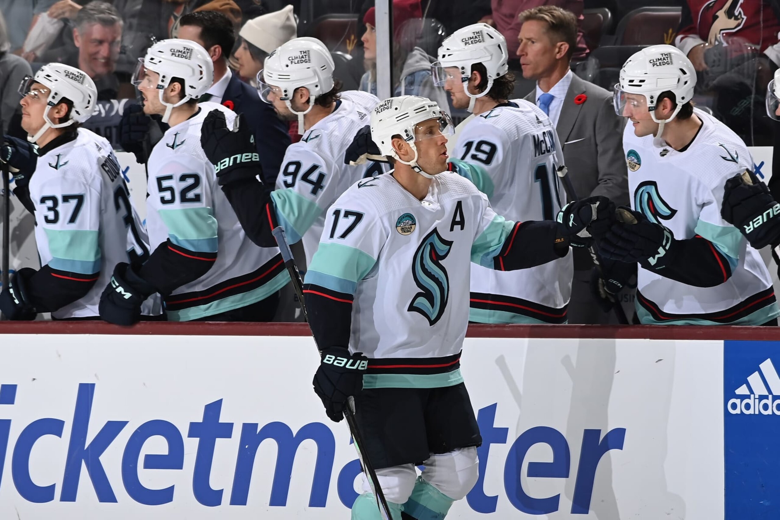 TEMPE, ARIZONA - NOVEMBER 07: Jaden Schwartz #17 of the Seattle Kraken celebrates with teammates on the bench after scoring a goal against the Arizona Coyotes during the third period of the game at Mullett Arena on November 07, 2023 in Tempe, Arizona. (Photo by Norm Hall/NHLI via Getty Images)
