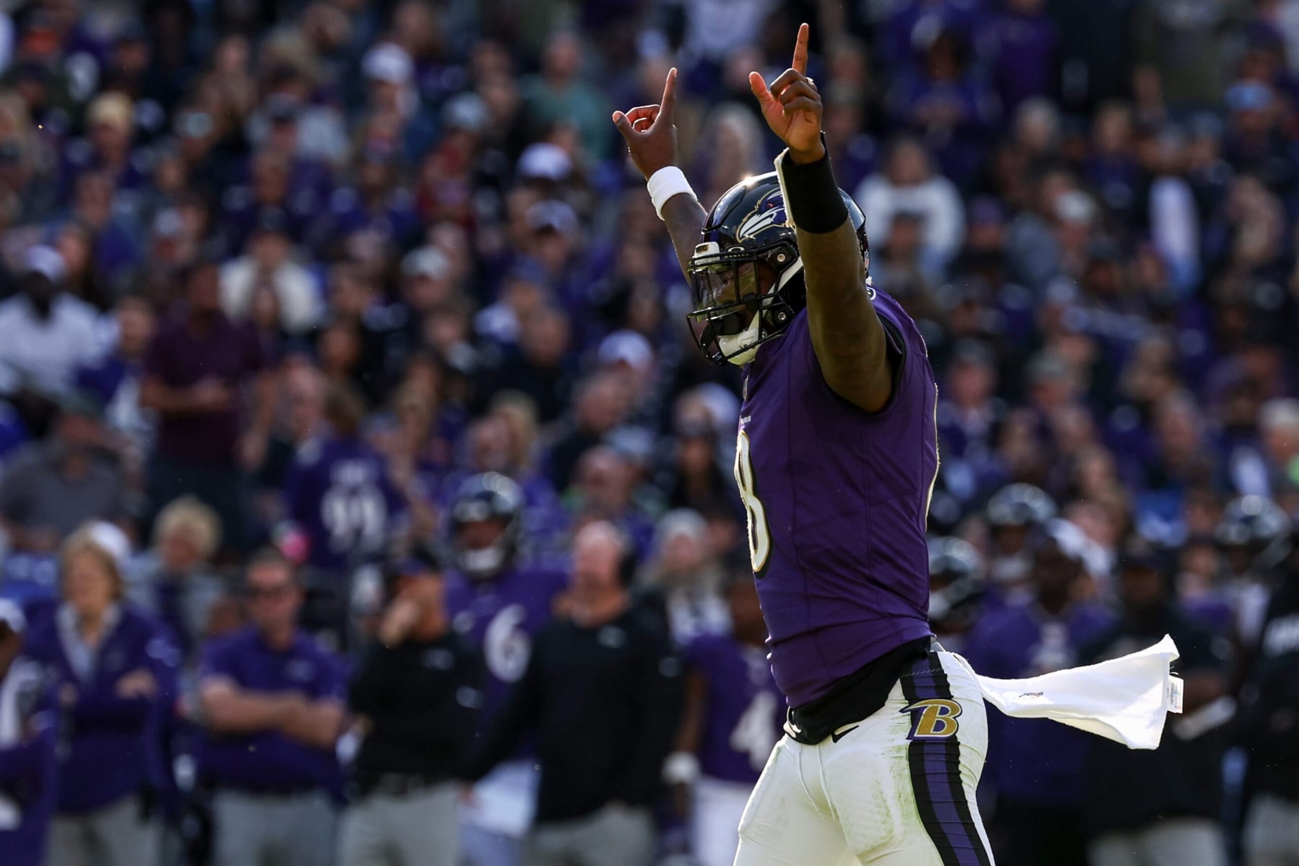 BALTIMORE, MARYLAND - NOVEMBER 05: Quarterback Lamar Jackson #8 of the Baltimore Ravens celebrates a touchdown against the Seattle Seahawks during the second quarter at M&T Bank Stadium on November 05, 2023 in Baltimore, Maryland. (Photo by Patrick Smith/Getty Images)