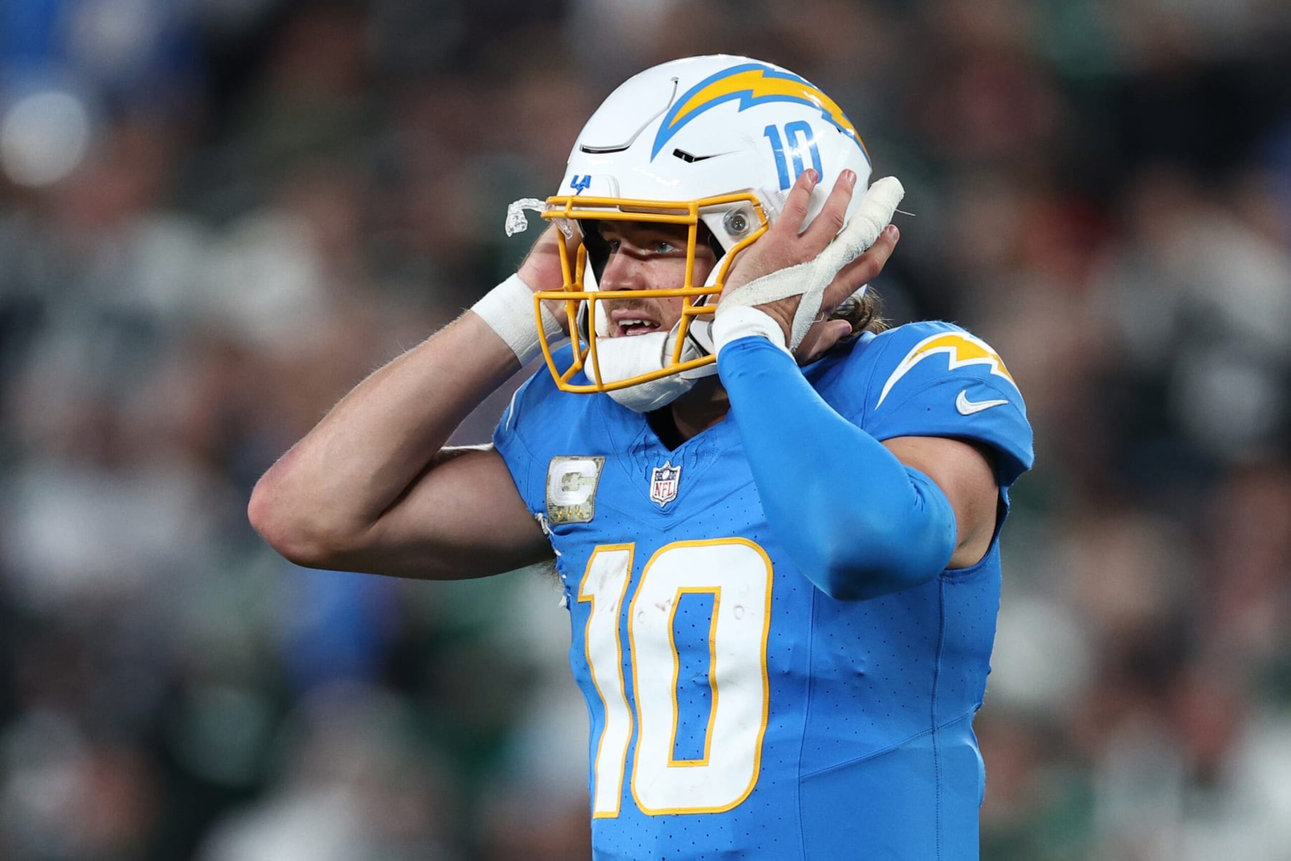 EAST RUTHERFORD, NEW JERSEY - NOVEMBER 06: Justin Herbert #10 of the Los Angeles Chargers reacts during the second half against the New York Jets at MetLife Stadium on November 06, 2023 in East Rutherford, New Jersey. (Photo by Elsa/Getty Images)
