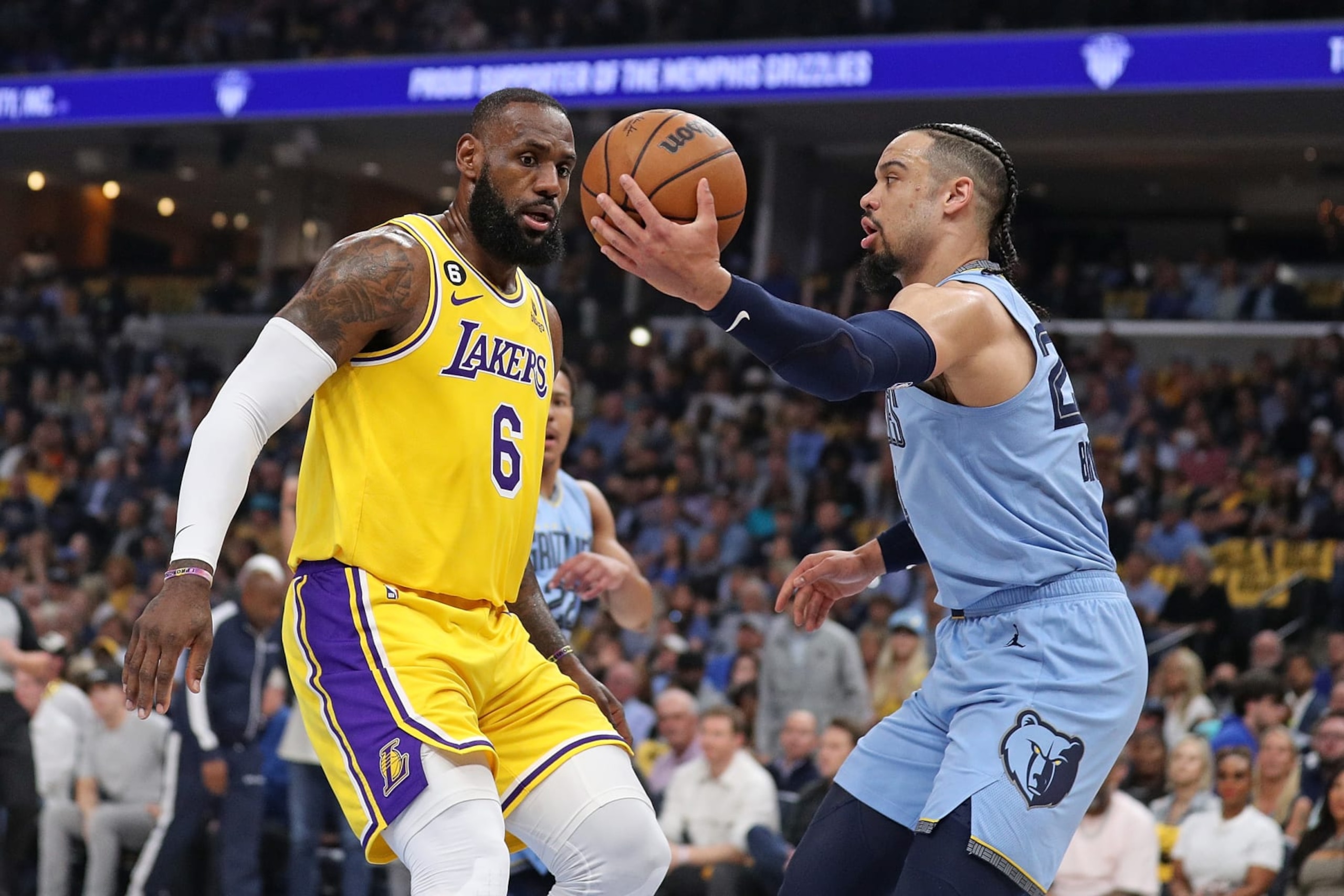 MEMPHIS, TENNESSEE - APRIL 26: Dillon Brooks #24 of the Memphis Grizzlies handles the ball against LeBron James #6 of the Los Angeles Lakers during Game Five of the Western Conference First Round Playoffs at FedExForum on April 26, 2023 in Memphis, Tennessee. NOTE TO USER: User expressly acknowledges and agrees that, by downloading and or using this photograph, User is consenting to the terms and conditions of the Getty Images License Agreement. (Photo by Justin Ford/Getty Images) MEMPHIS, TENNESSEE - APRIL 26: Dillon Brooks #24 of the Memphis Grizzlies handles the ball against LeBron James #6 of the Los Angeles Lakers during Game Five of the Western Conference First Round Playoffs at FedExForum on April 26, 2023 in Memphis, Tennessee. NOTE TO USER: User expressly acknowledges and agrees that, by downloading and or using this photograph, User is consenting to the terms and conditions of the Getty Images License Agreement. (Photo by Justin Ford/Getty Images)