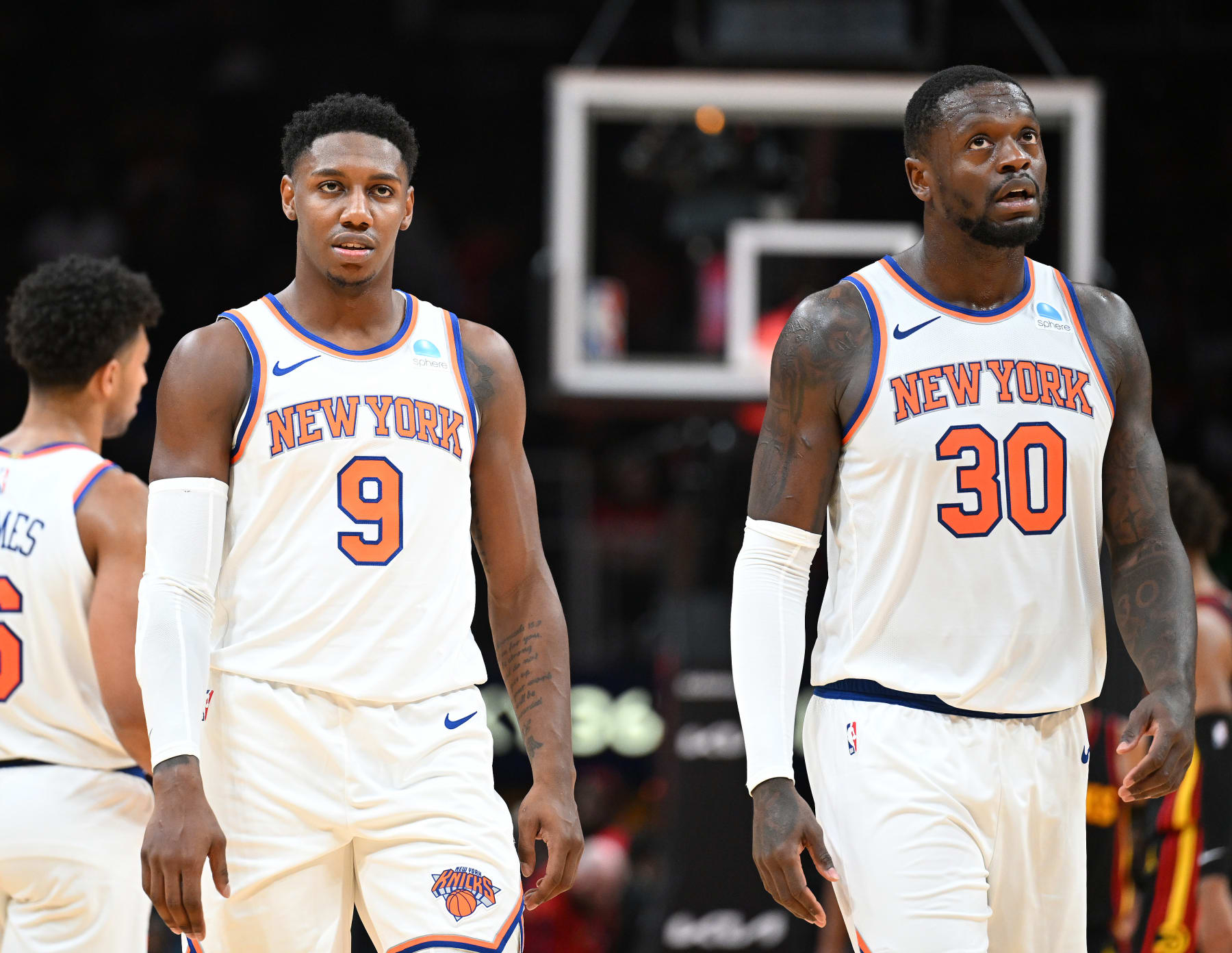 ATLANTA, GA - OCTOBER 27: RJ Barrett #9 and Julius Randle #30 of the New York Knicks look on during the game against the Atlanta Hawks on October 27, 2023 at State Farm Arena in Atlanta, Georgia.  NOTE TO USER: User expressly acknowledges and agrees that, by downloading and/or using this Photograph, user is consenting to the terms and conditions of the Getty Images License Agreement. Mandatory Copyright Notice: Copyright 2023 NBAE (Photo by Adam Hagy/NBAE via Getty Images)