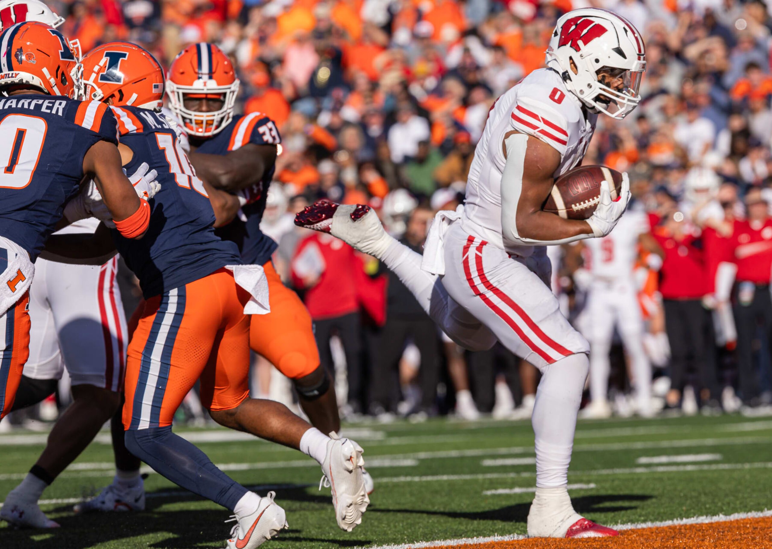 CHAMPAIGN, ILLINOIS - OCTOBER 21: Braelon Allen #0 of the Wisconsin Badgers runs for a touchdown during the game against the Illinois Fighting Illini at Memorial Stadium on October 21, 2023 in Champaign, Illinois. (Photo by Michael Hickey/Getty Images) CHAMPAIGN, ILLINOIS - OCTOBER 21: Braelon Allen #0 of the Wisconsin Badgers runs for a touchdown during the game against the Illinois Fighting Illini at Memorial Stadium on October 21, 2023 in Champaign, Illinois. (Photo by Michael Hickey/Getty Images)