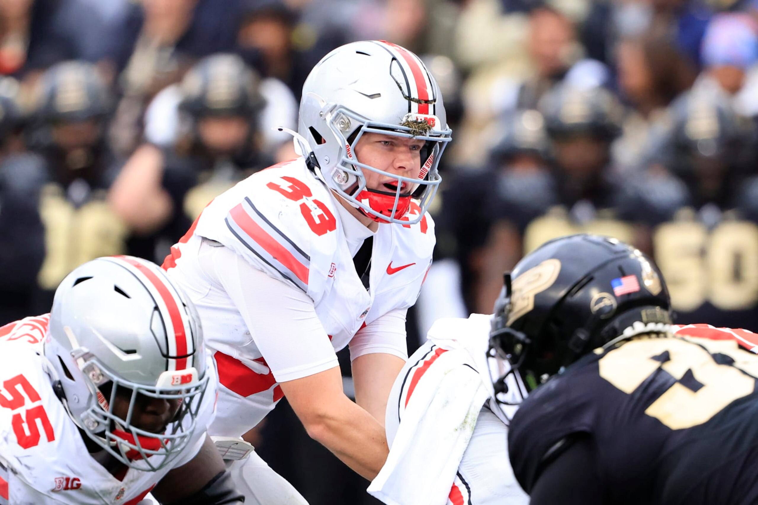 WEST LAFAYETTE, INDIANA - OCTOBER 14: Devin Brown #33 of the Ohio State Buckeyes prepares to snap the ball in the game against the Purdue Boilermakers at Ross-Ade Stadium on October 14, 2023 in West Lafayette, Indiana. (Photo by Justin Casterline/Getty Images) WEST LAFAYETTE, INDIANA - OCTOBER 14: Devin Brown #33 of the Ohio State Buckeyes prepares to snap the ball in the game against the Purdue Boilermakers at Ross-Ade Stadium on October 14, 2023 in West Lafayette, Indiana. (Photo by Justin Casterline/Getty Images)